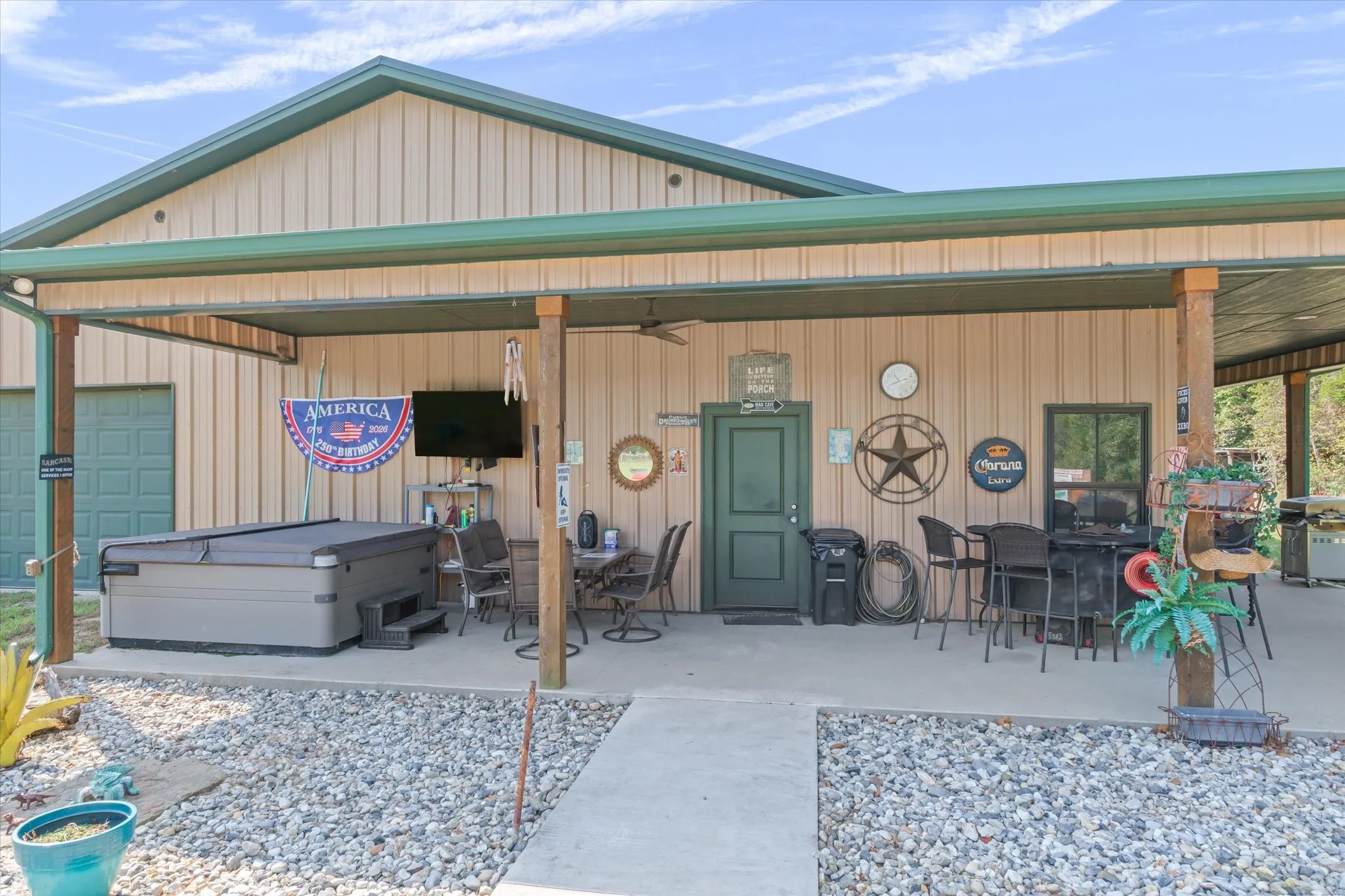 Covered patio, river rock makes the landscaping easy to care for.