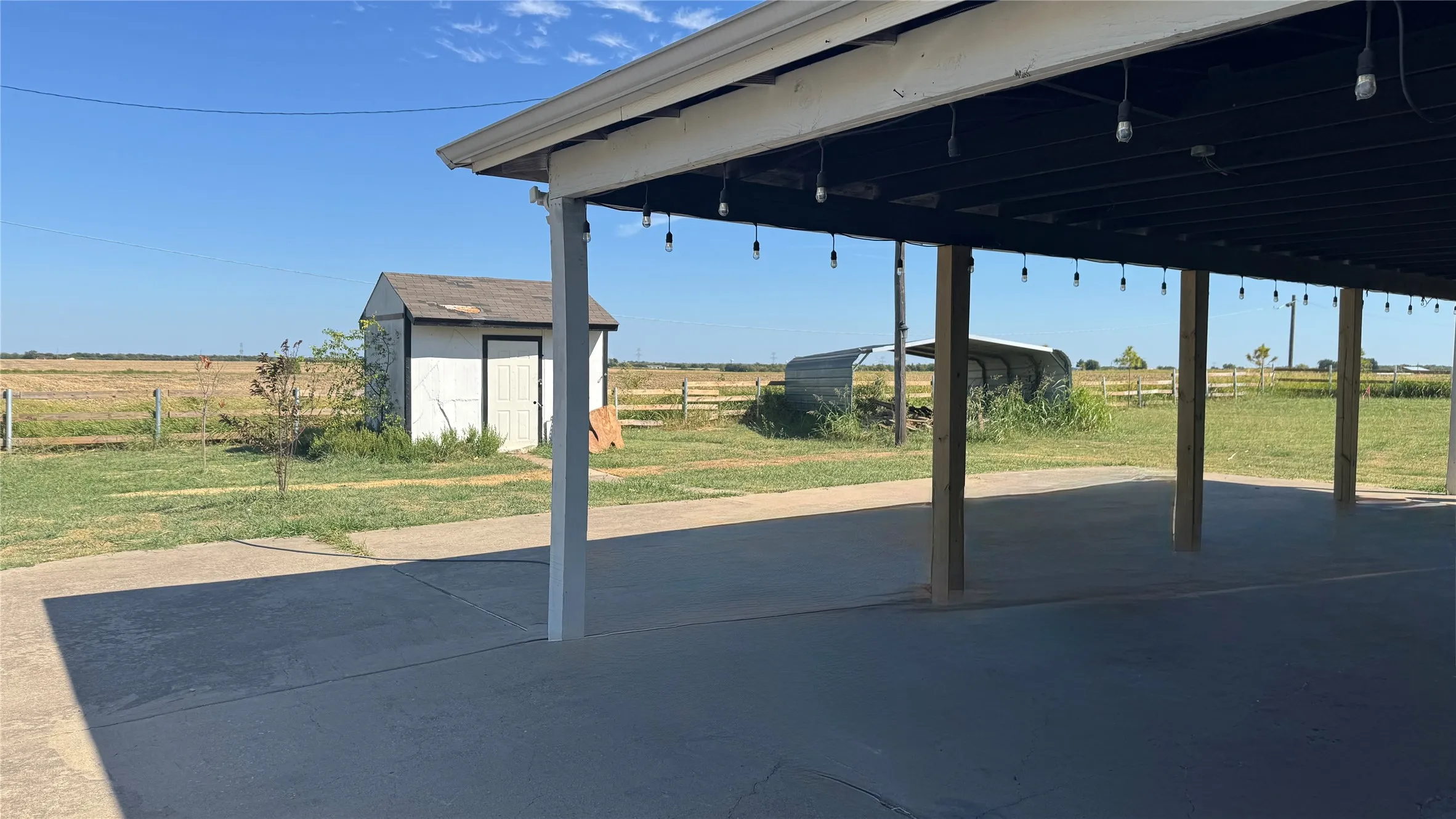 Covered patio or can use as a carport