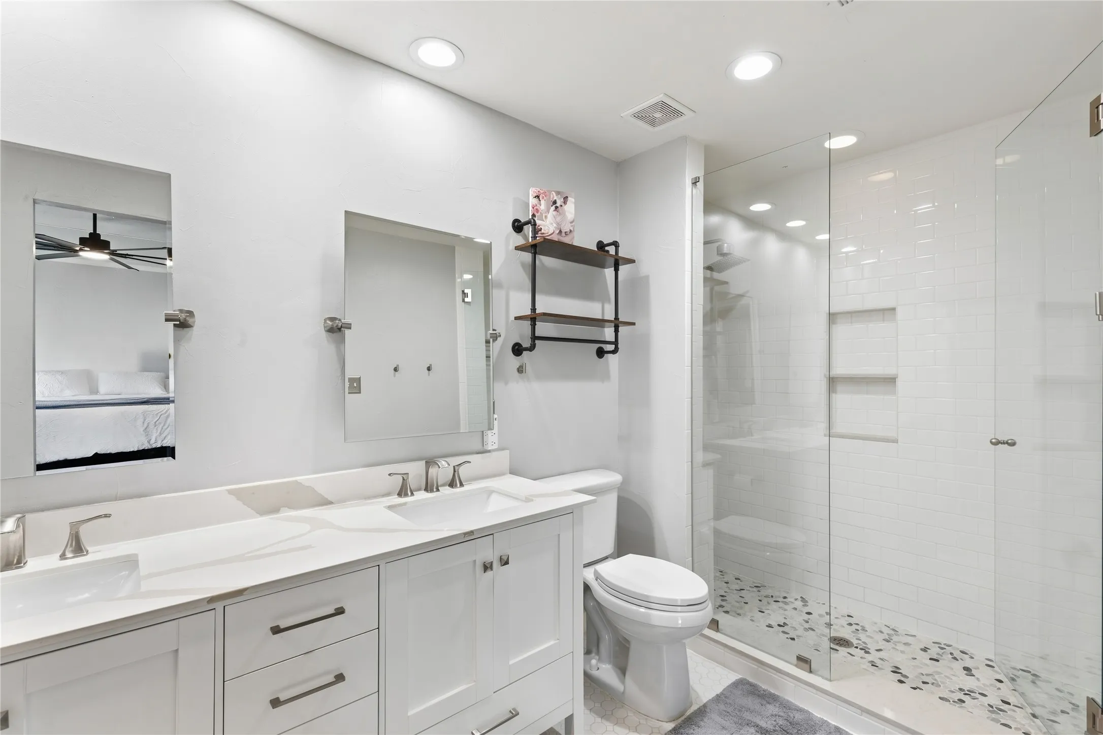 Double vanity with undermount sinks and brushed nickel fixtures
