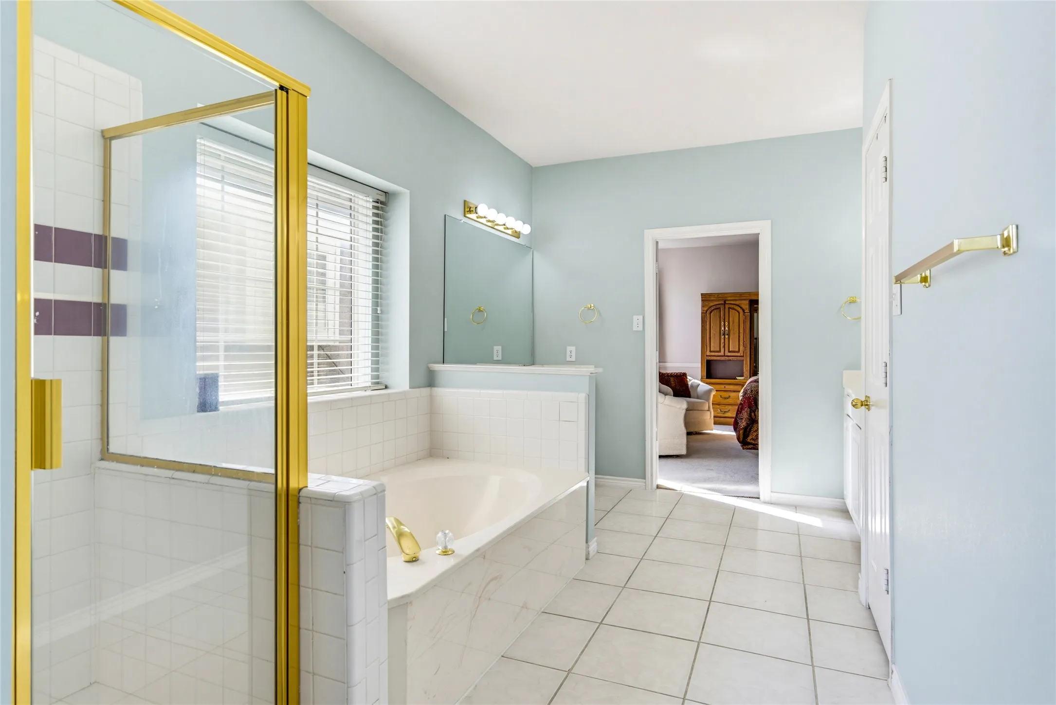 Separate tub and shower in this spacious bathroom....