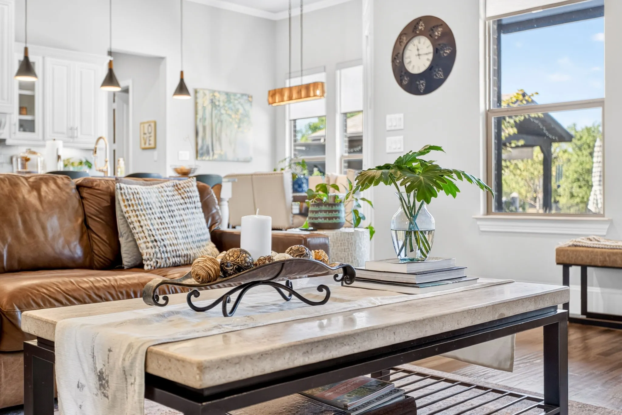 Open concept living area featuring light gray walls, recessed lighting, and wood-finish flooring