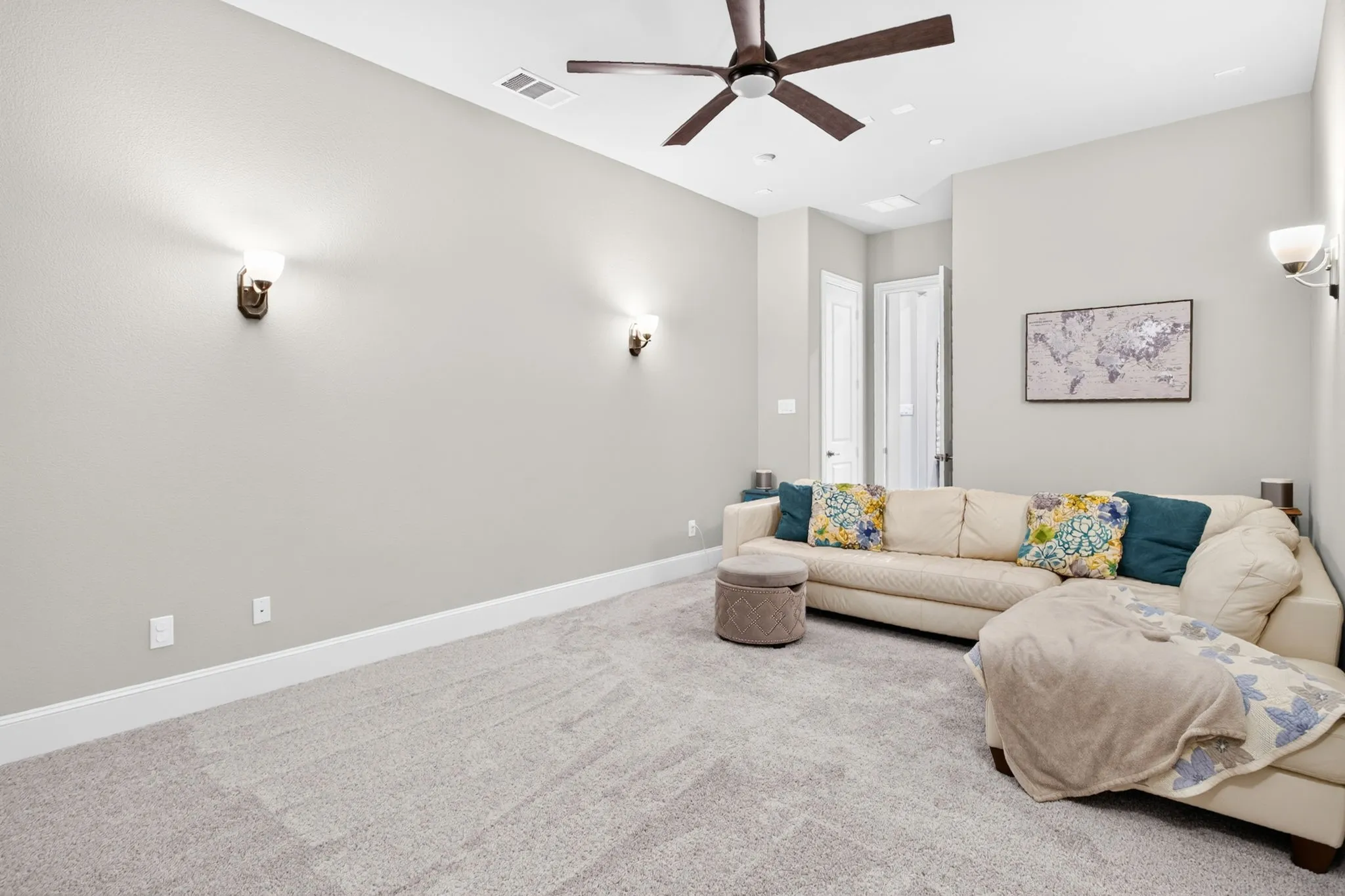 Plush carpet flooring, recessed lighting, and a ceiling fan