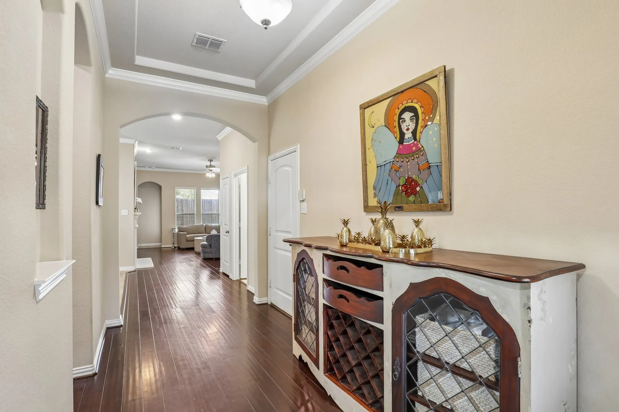 Entry with open-concept through the heart of the home.