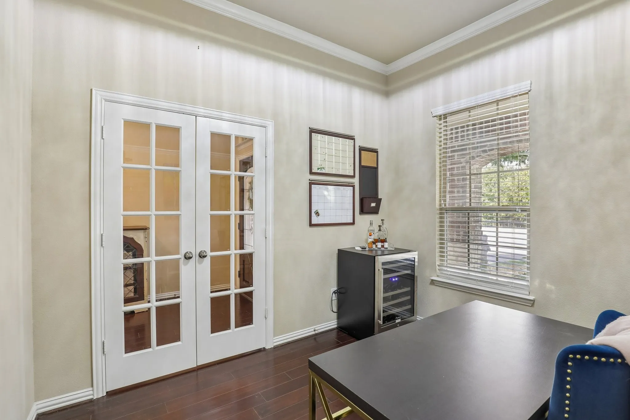 Dedicated office with French door entry.
