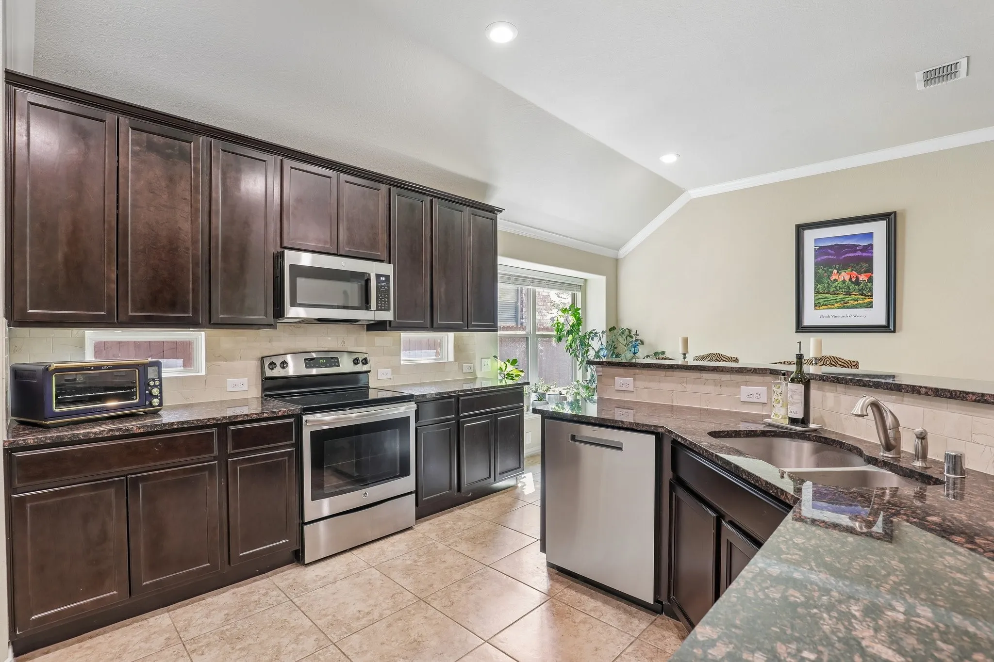 Kitchen with stainless steel appliances.