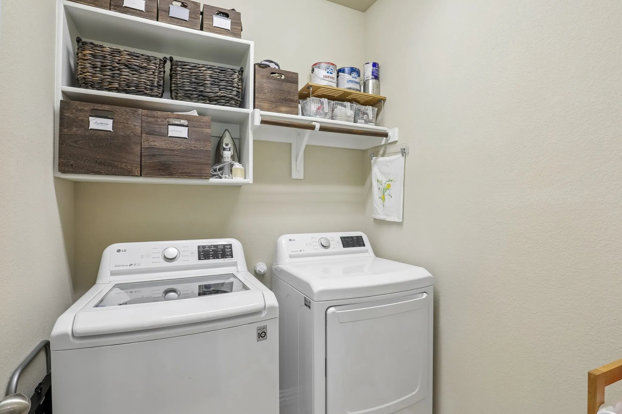 Laundry room with shelving.