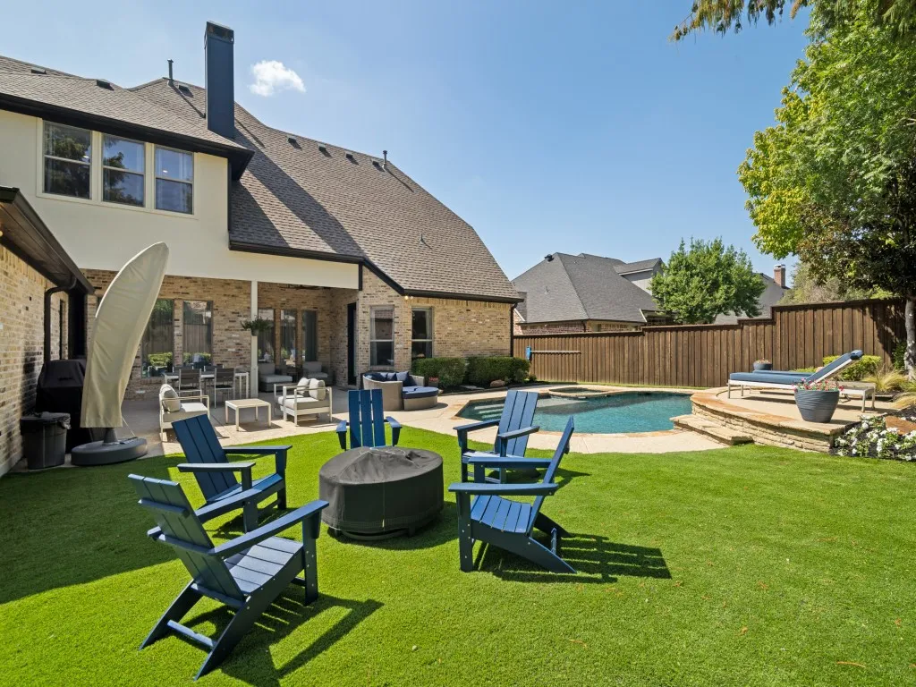 Another look at the rear elevation of the home, pool and back yard.