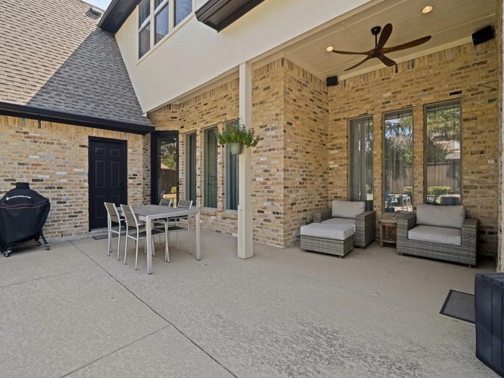 Covered and open extended back patio.