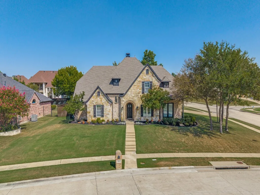 Corner lot with mature trees and landscaping