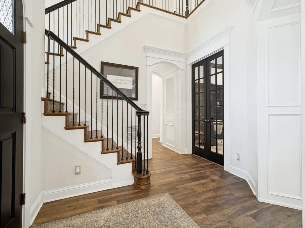 View from the entry toward the office shows the clean lines and detailed features of the home.