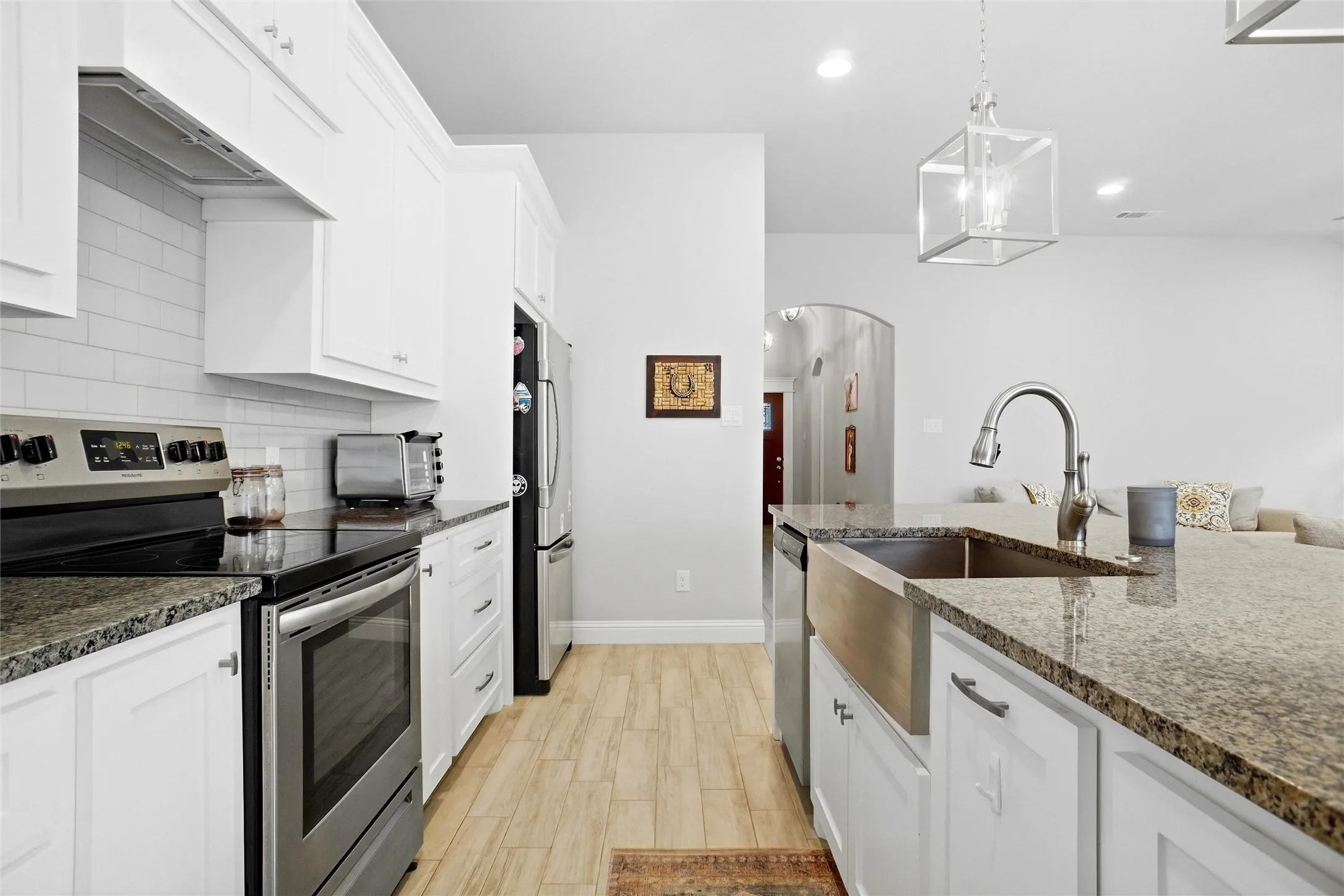 Kitchen with Cabinets, Granite Counters and Farm Sink