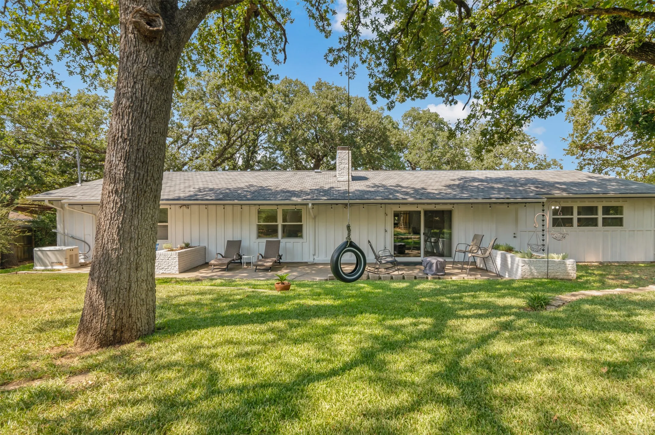 Large patio and plenty of shade trees