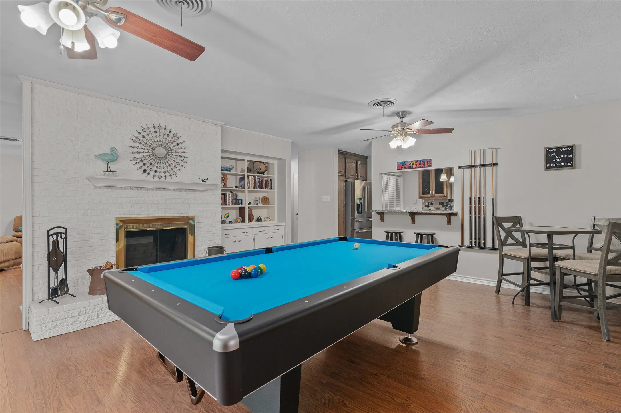 This large dining area, off the kitchen, makes a great flex space to fit your family's needs!   It's currently used as a game room but could be a 2nd lvg space.