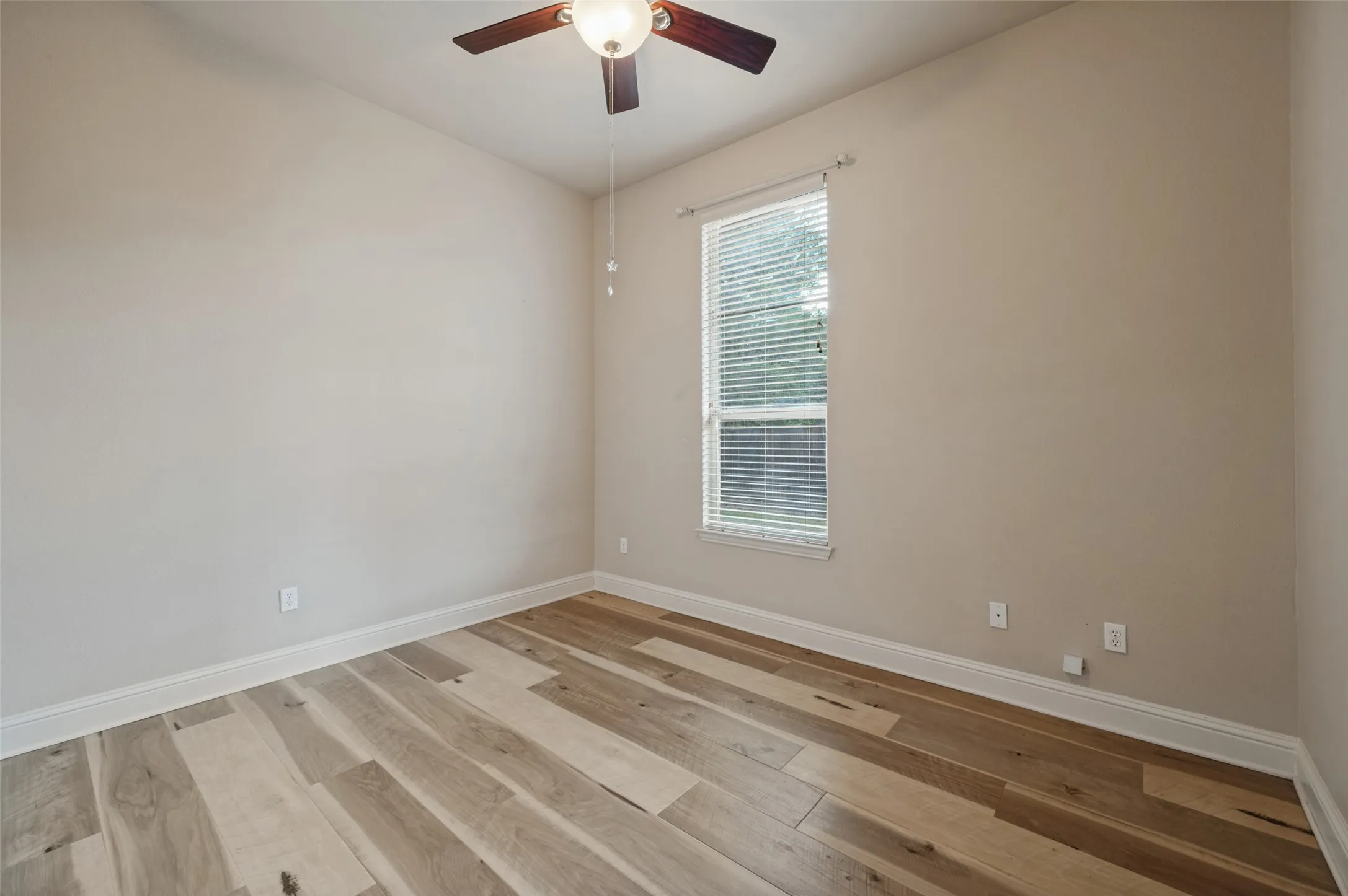 Bedroom #1 is oversized, has great natural light and features a walk in closet and ceiling fan