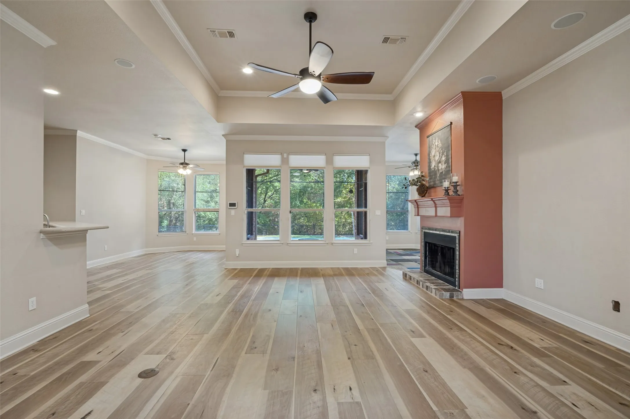 Exceptional space for entertaining - 14' ceilings with recessed tray ceiling and double crown molding. Open concept space flows freely between the oversized breakfast nook and chef's kitchen