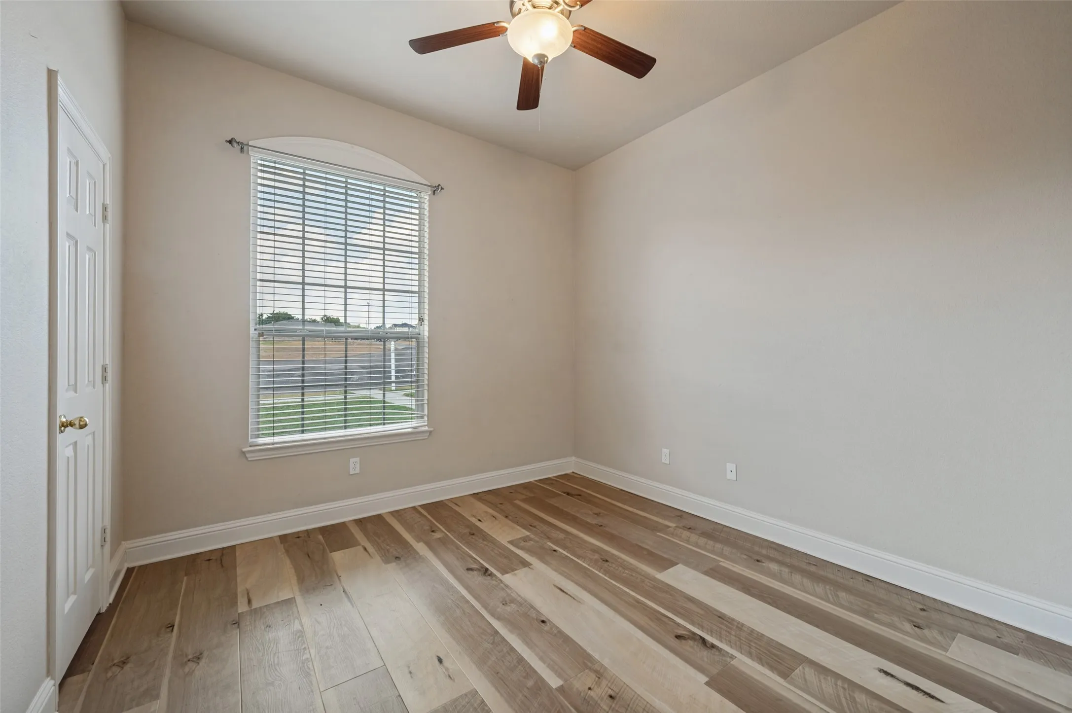 Bedroom #2 also has great light and features a walk in closet and ceiling fan
