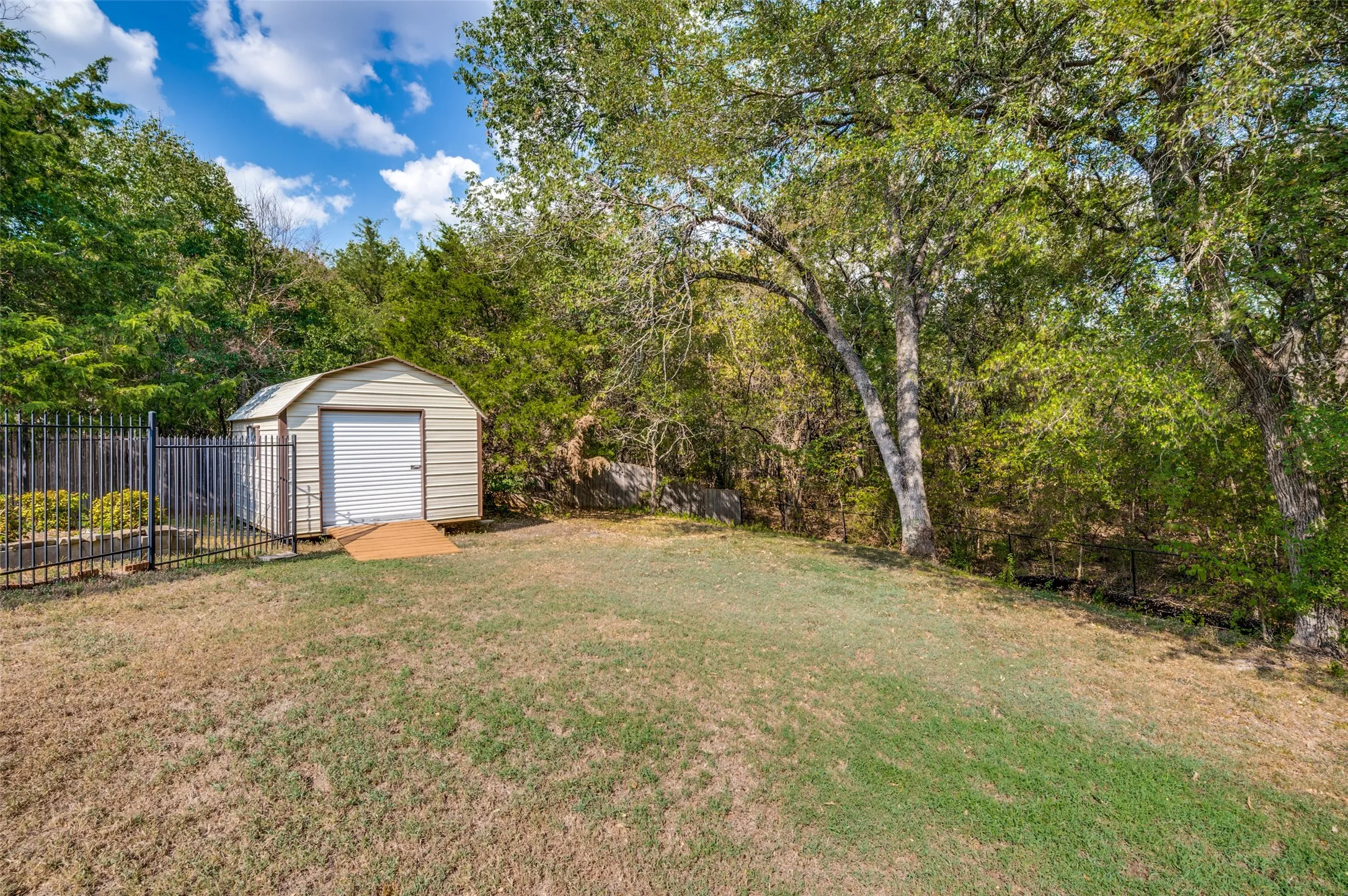 With a yard this large, this oversized shed will come in handy!