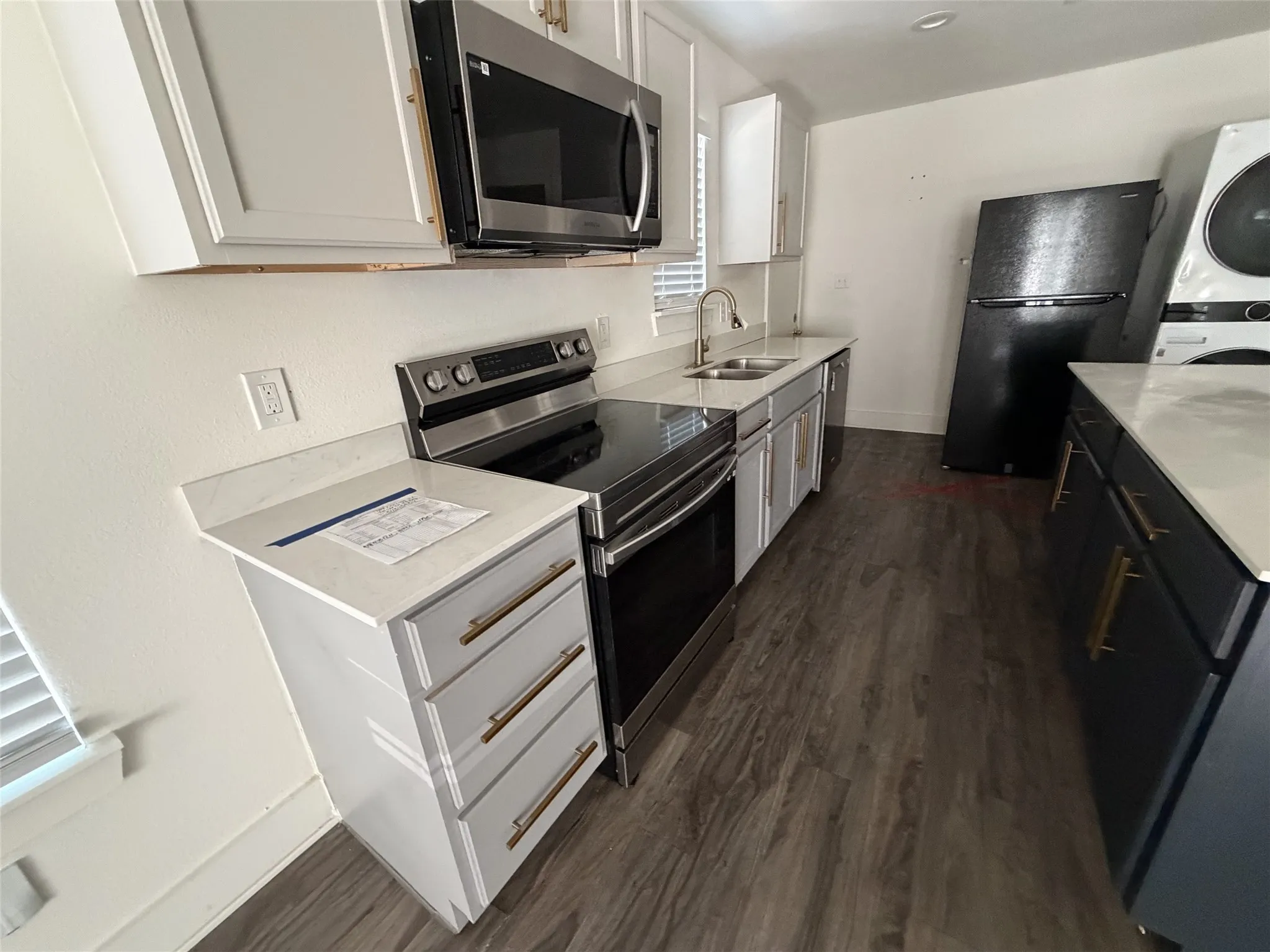 Kitchen with granite and appliances.