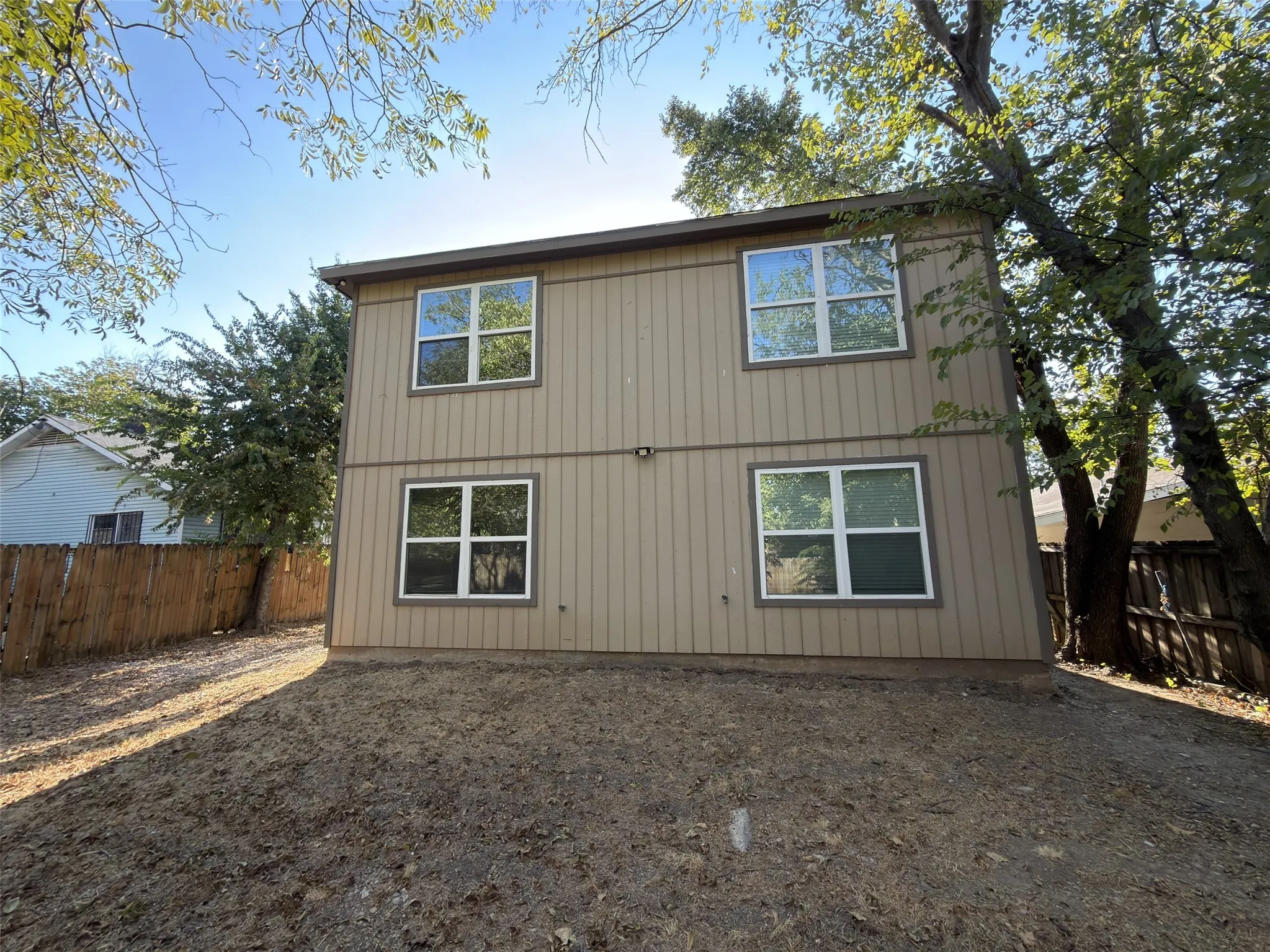 Back of duplex waiting for you to add a back patio.