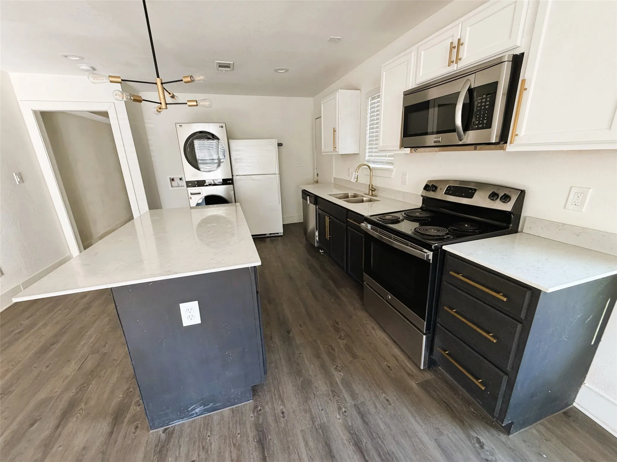 Kitchen with granite and appliances.
