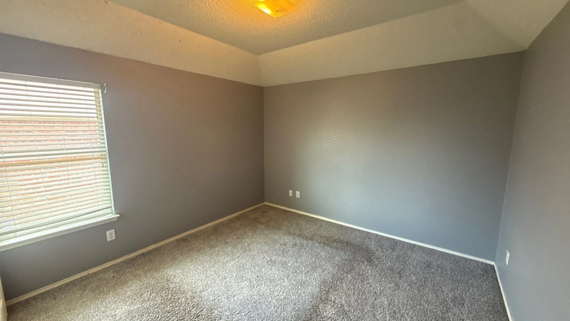Recessed ceiling with a flush-mount light fixture