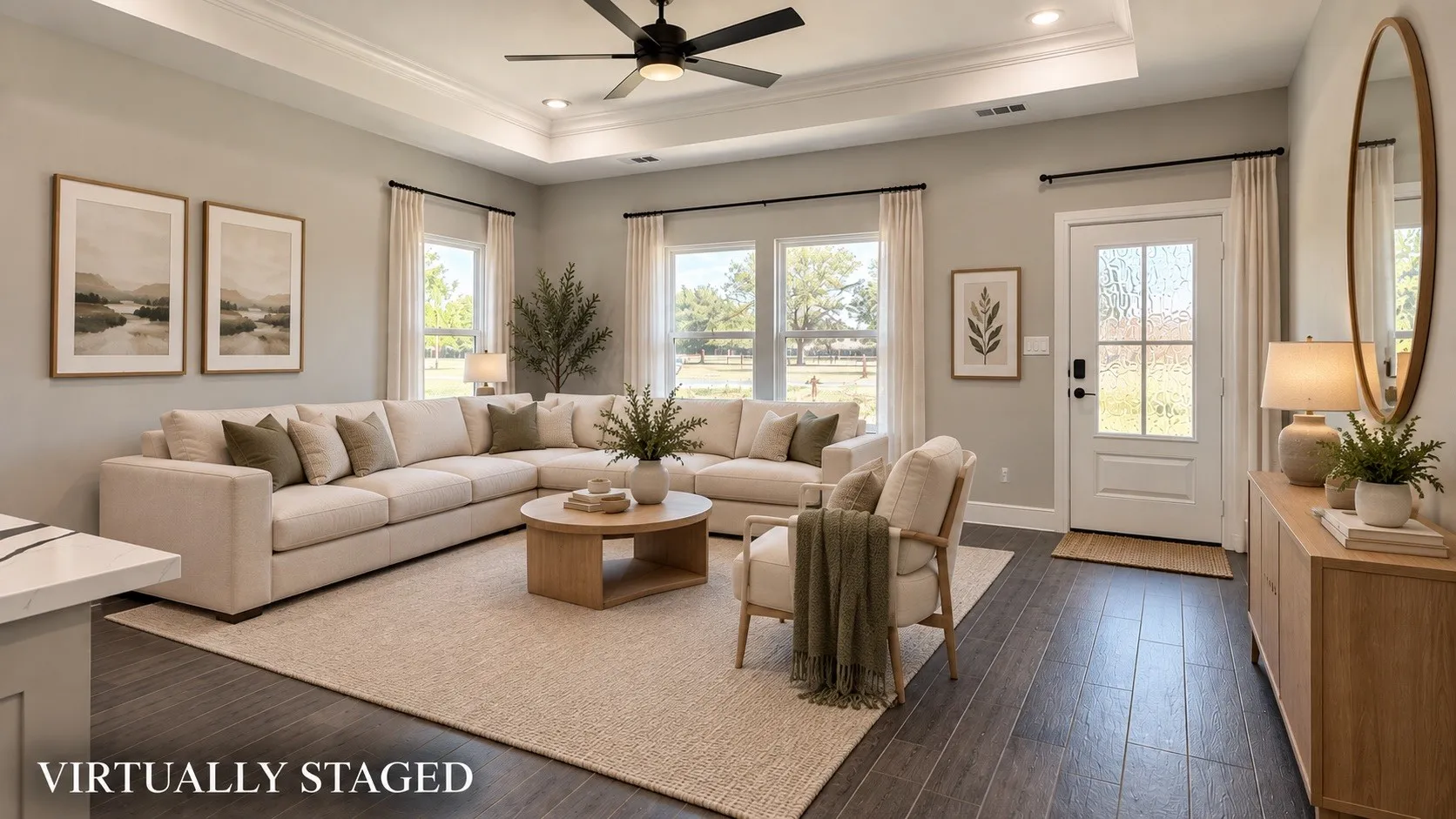 Tray ceiling with recessed lighting and a ceiling fan, multiple windows, and a glass-paned exterior door