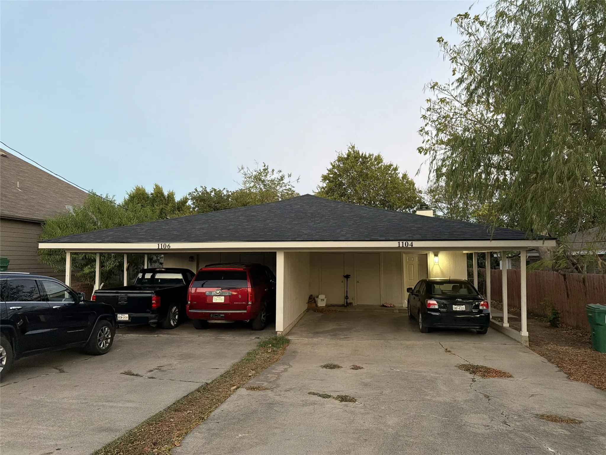 Attached carport providing covered parking