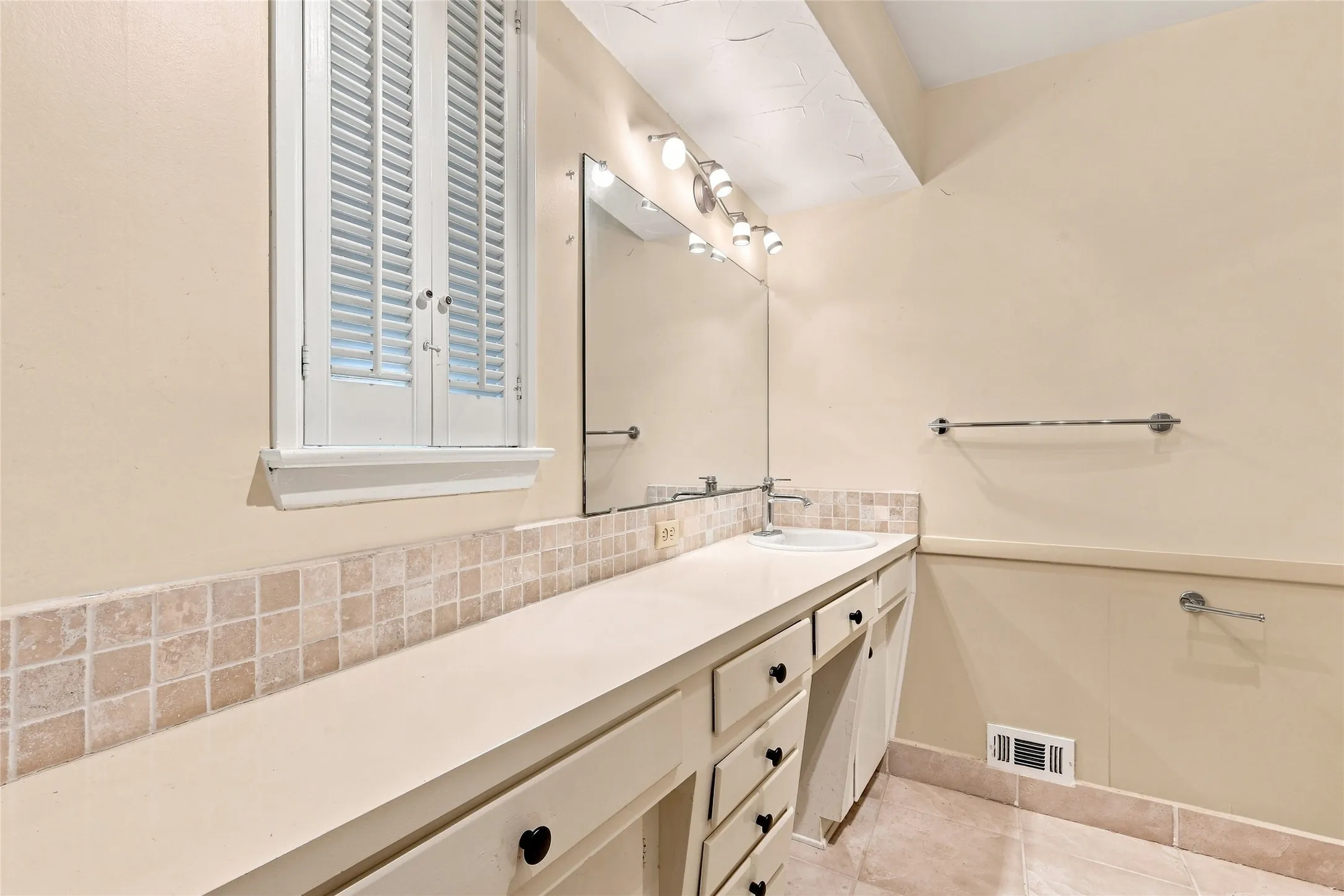 Lots of Space to Install Double Vanities or Keep the Art Deco Originals