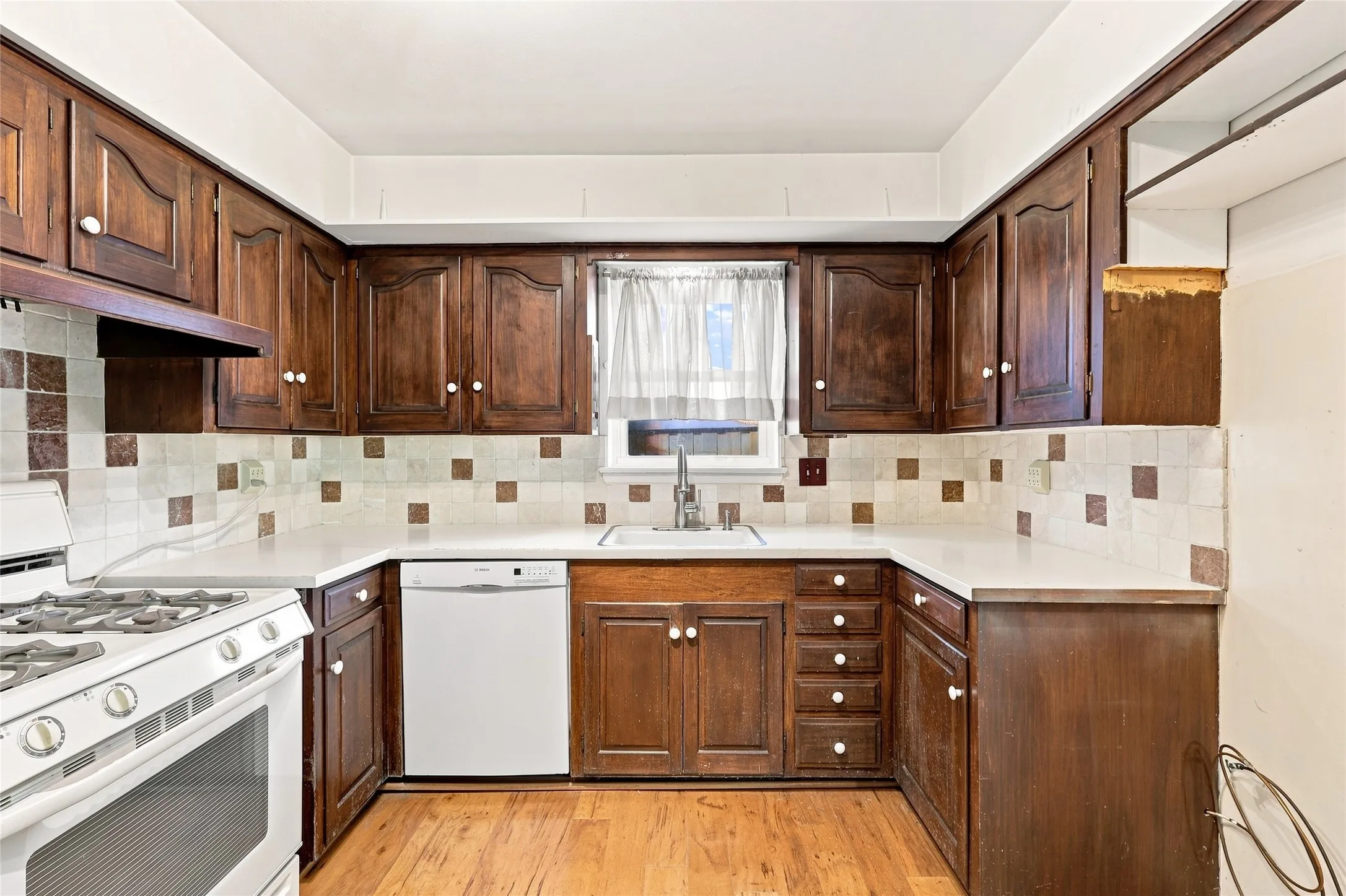 Want a Large Kitchen?  The Wall to the Right is the Perfect Choice to Expand