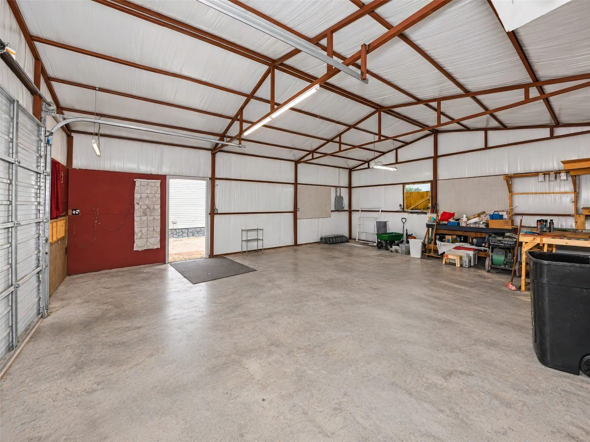 Spacious open-span structure with a high metal-beamed ceiling