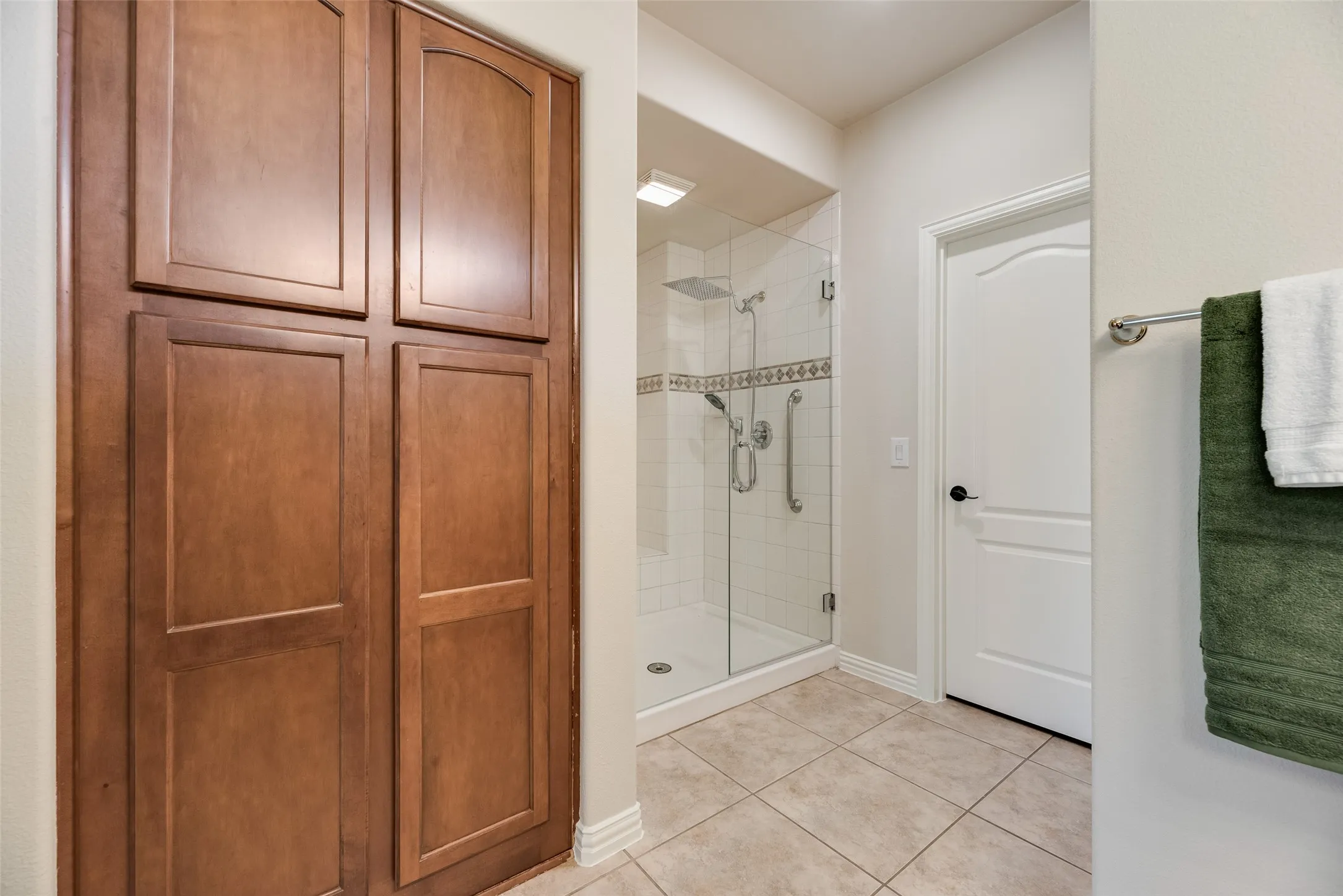 double shower with bench, new tall shower doors, extra linen closets