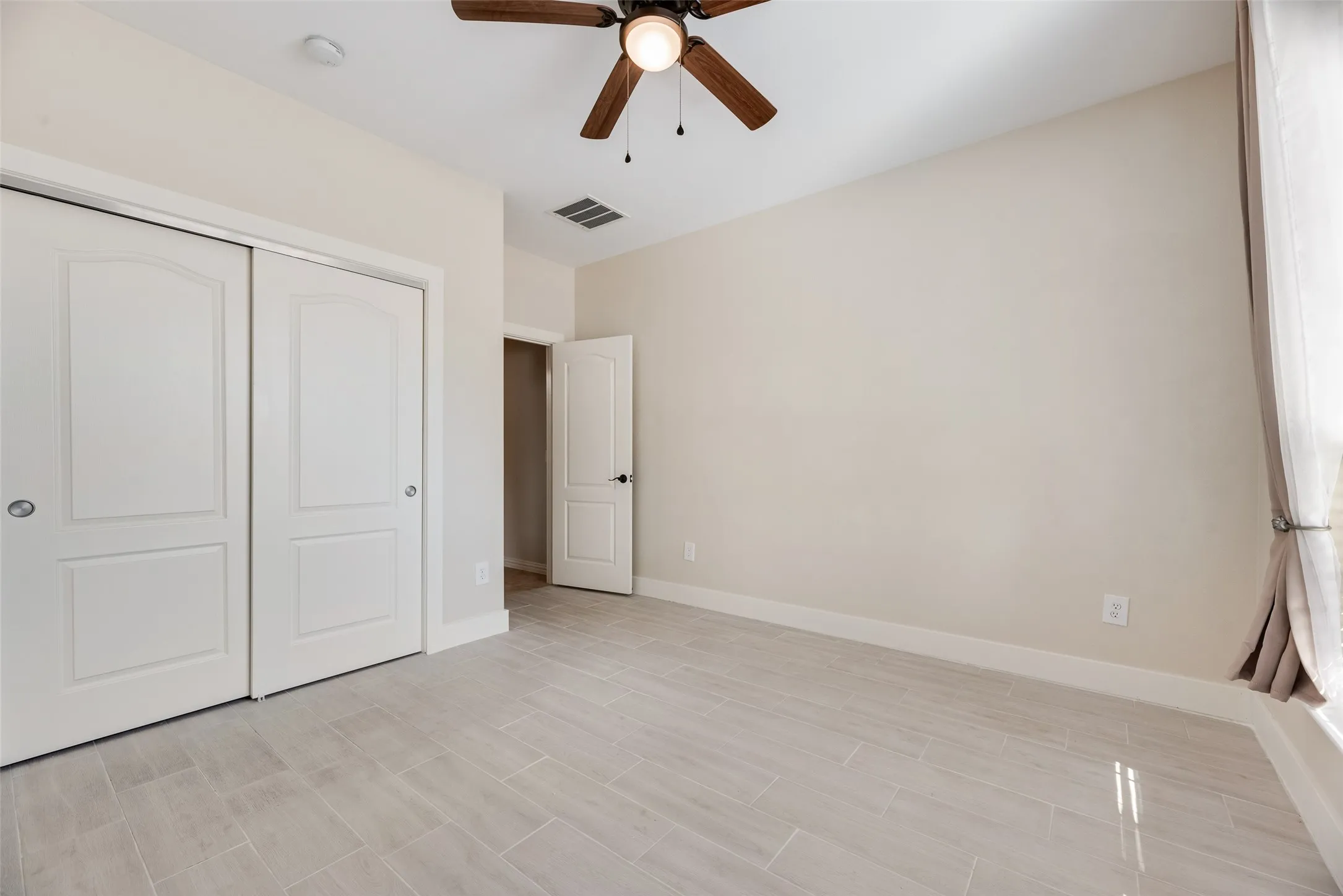 front Bedroom double doors, separate hallway