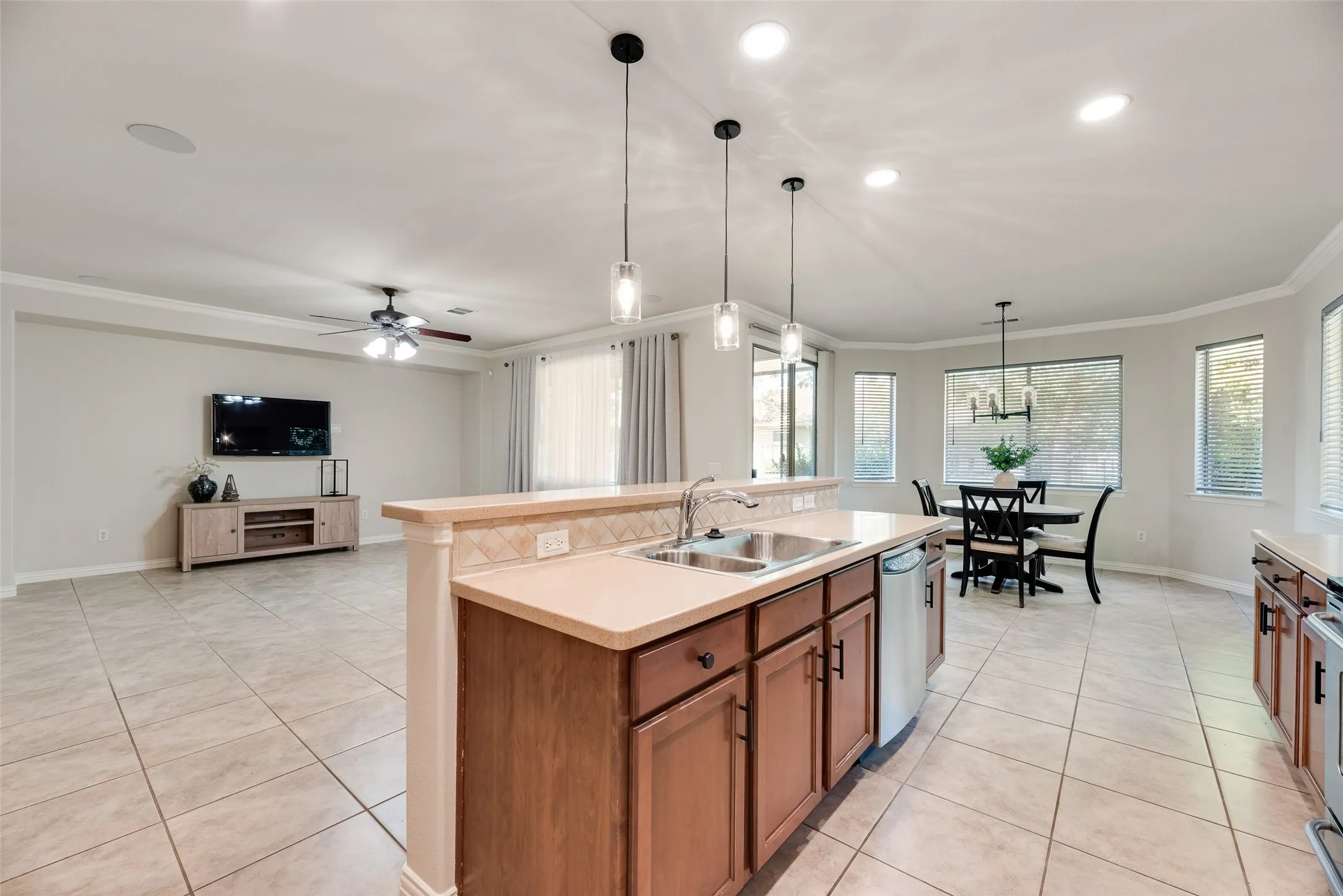 stainless steel appliances, double kitchen sink, garbage disposal, drawer pulls