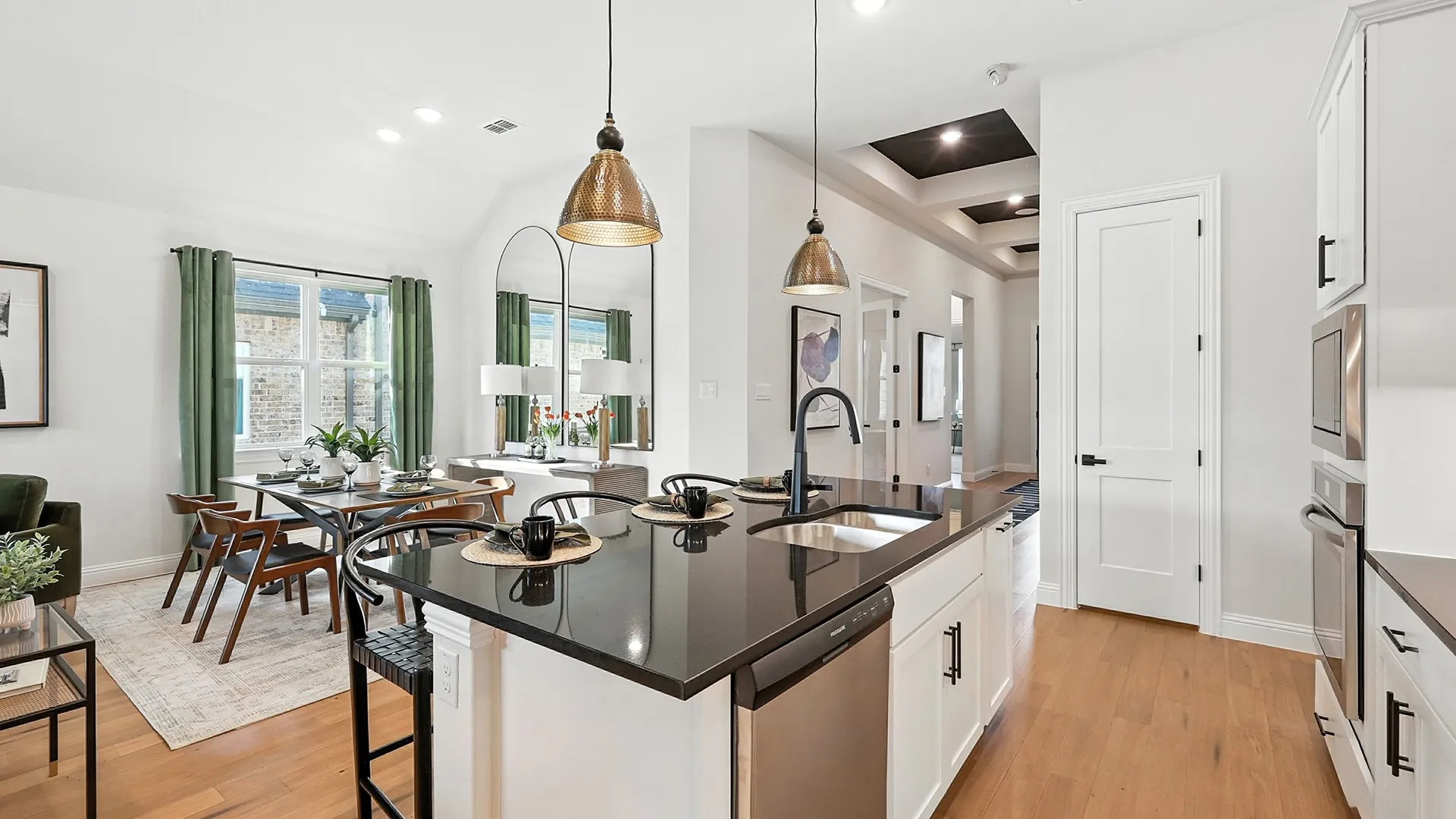 Model home photos of similar floorplans, not pictures of actual home.
