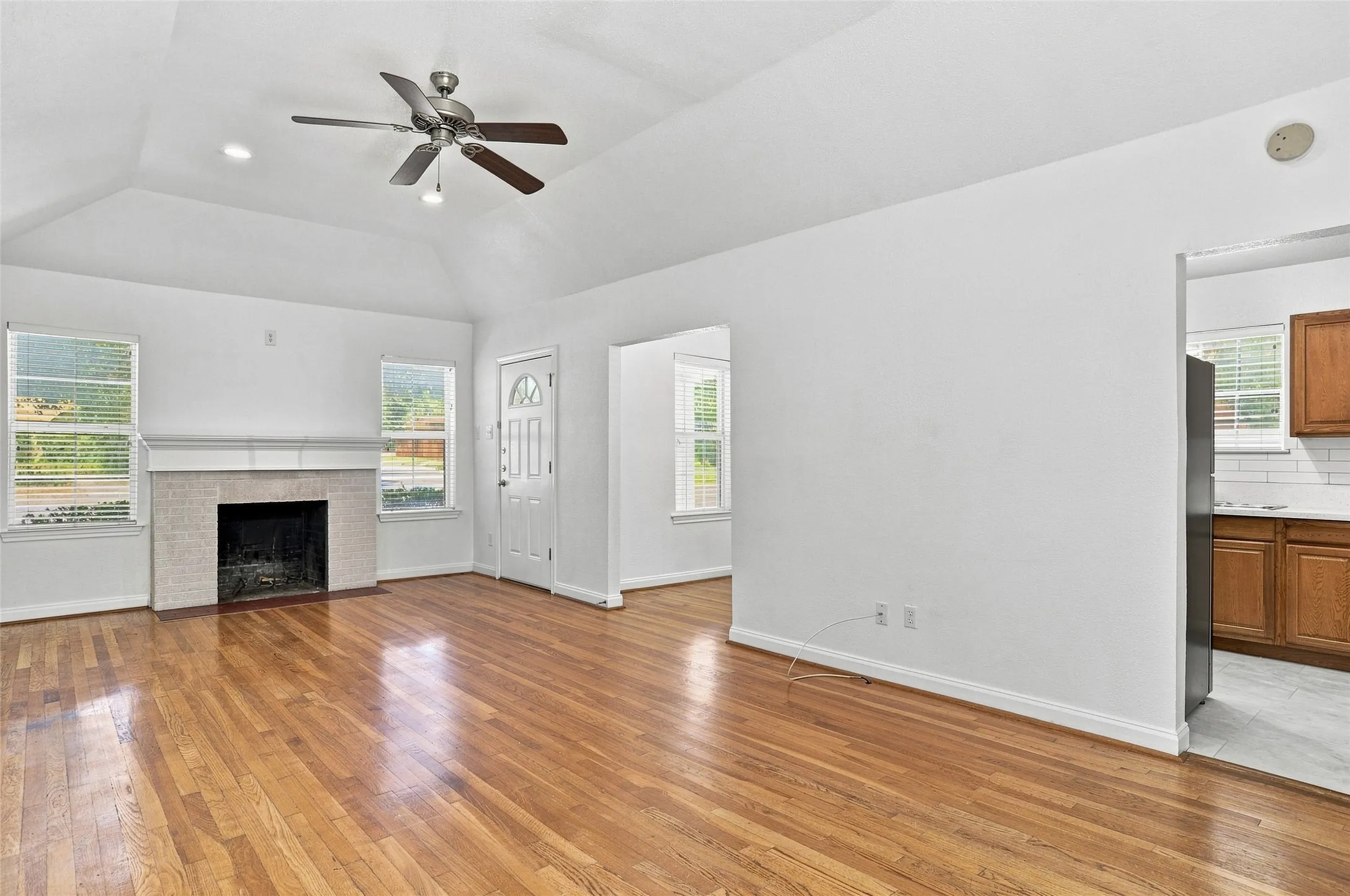 Open to kitchen and dining room