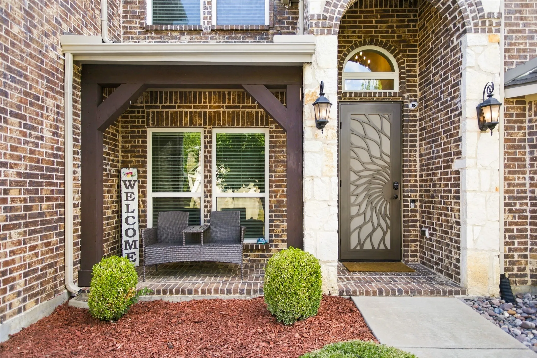 Rare covered porch with designer security door