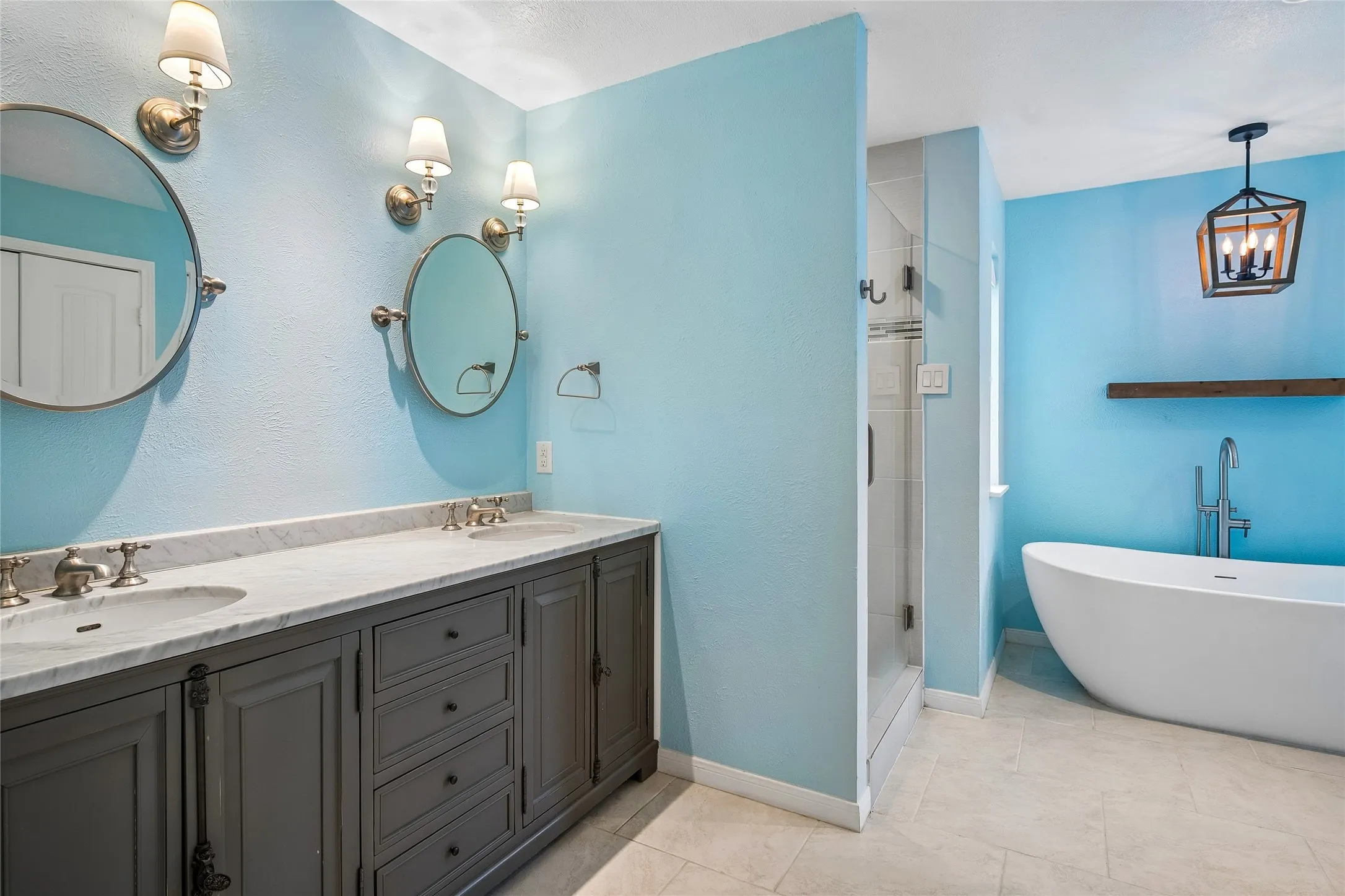 A large separate shower and soaking tub are features of the ensuite bath.
