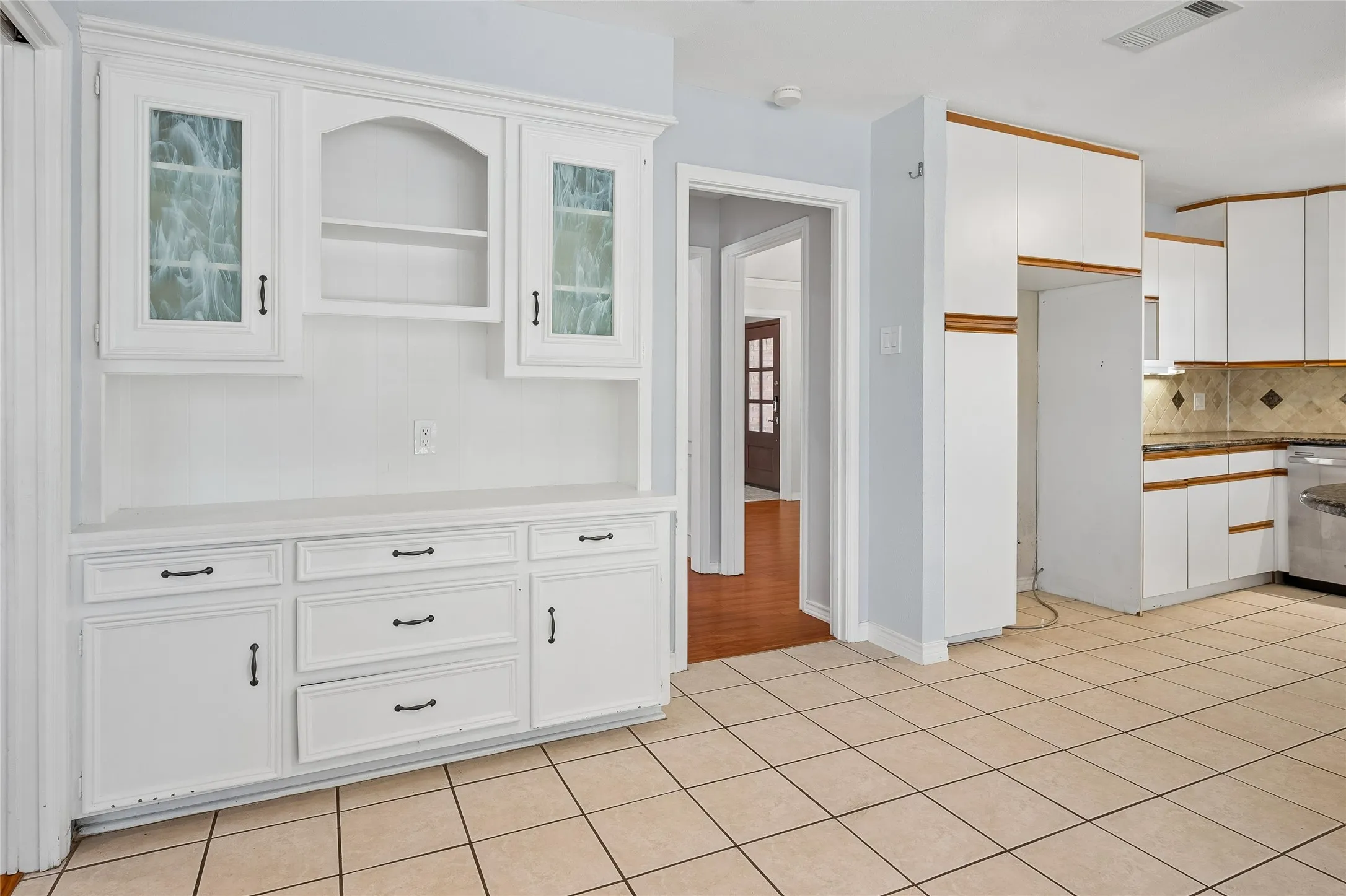 A built-in hutch offers cabinet space in the breakfast nook.