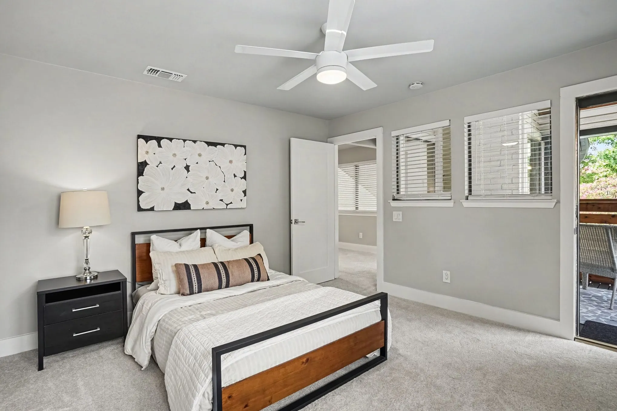 Guest bedroom with ensuite bath with balcony