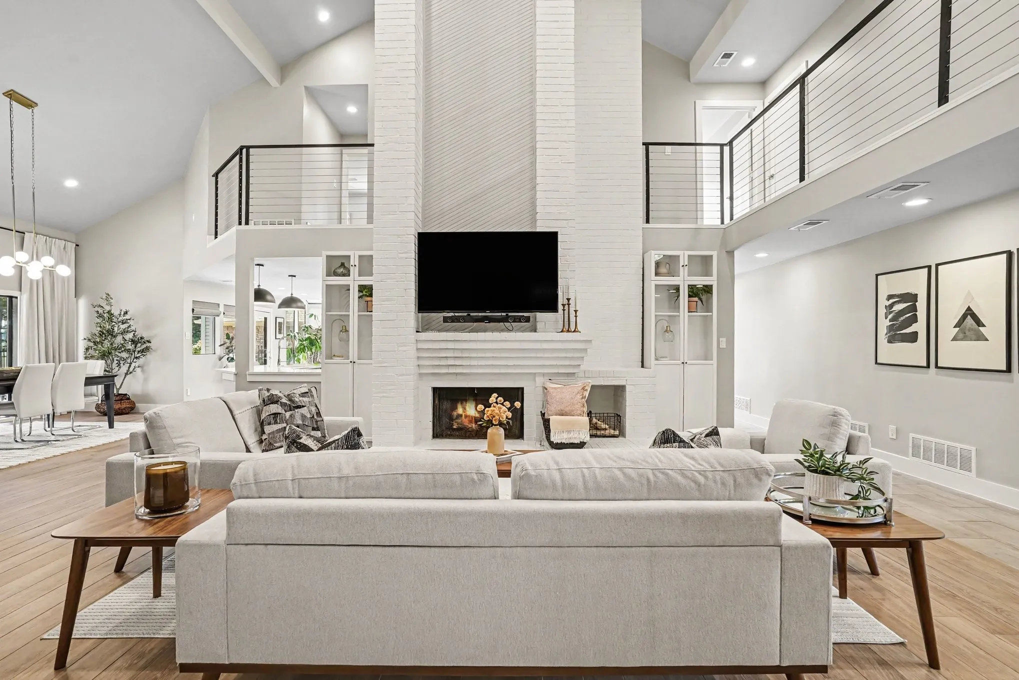 Living room looks into dining room and kitchen