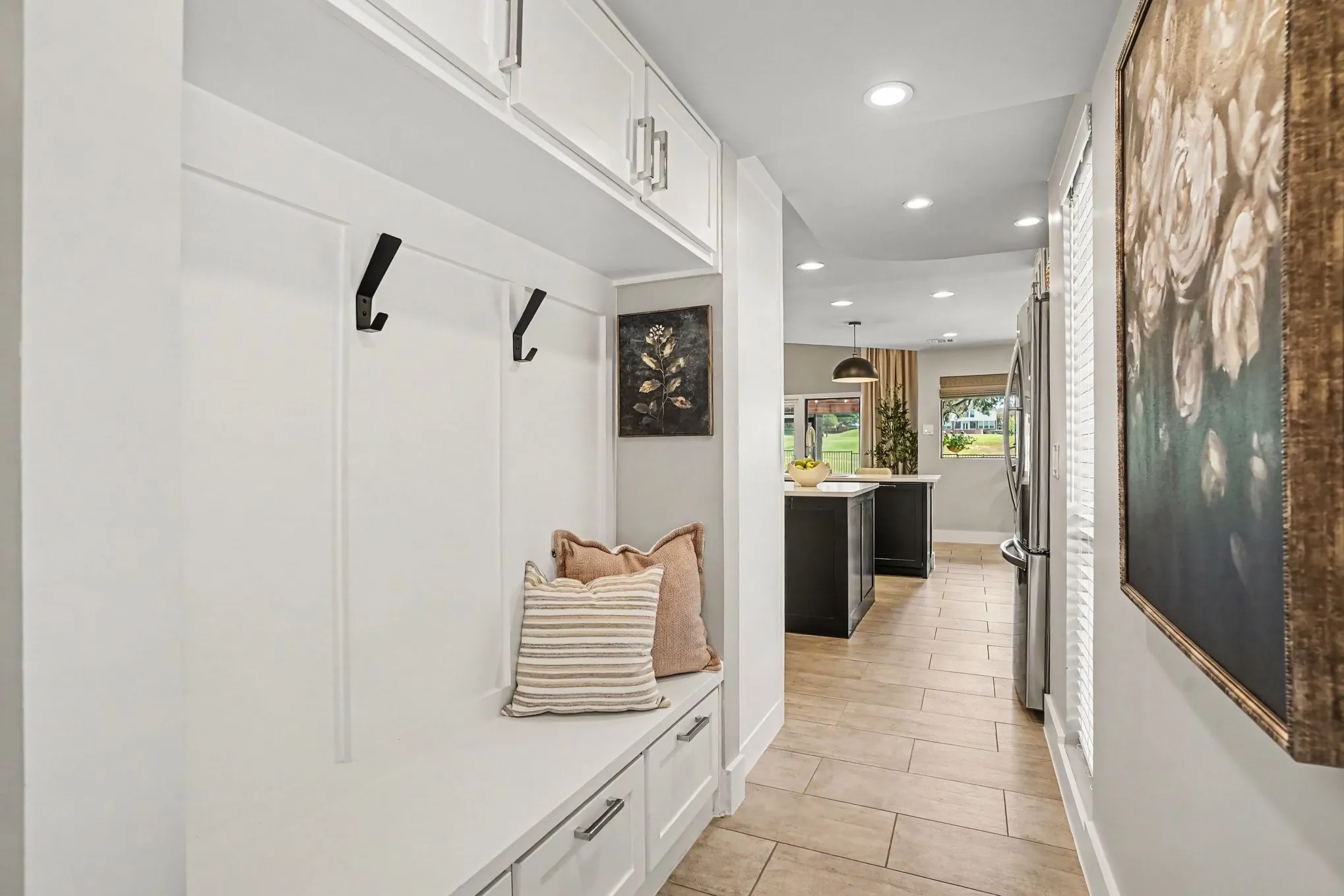 Mud Room with storage coming from garage