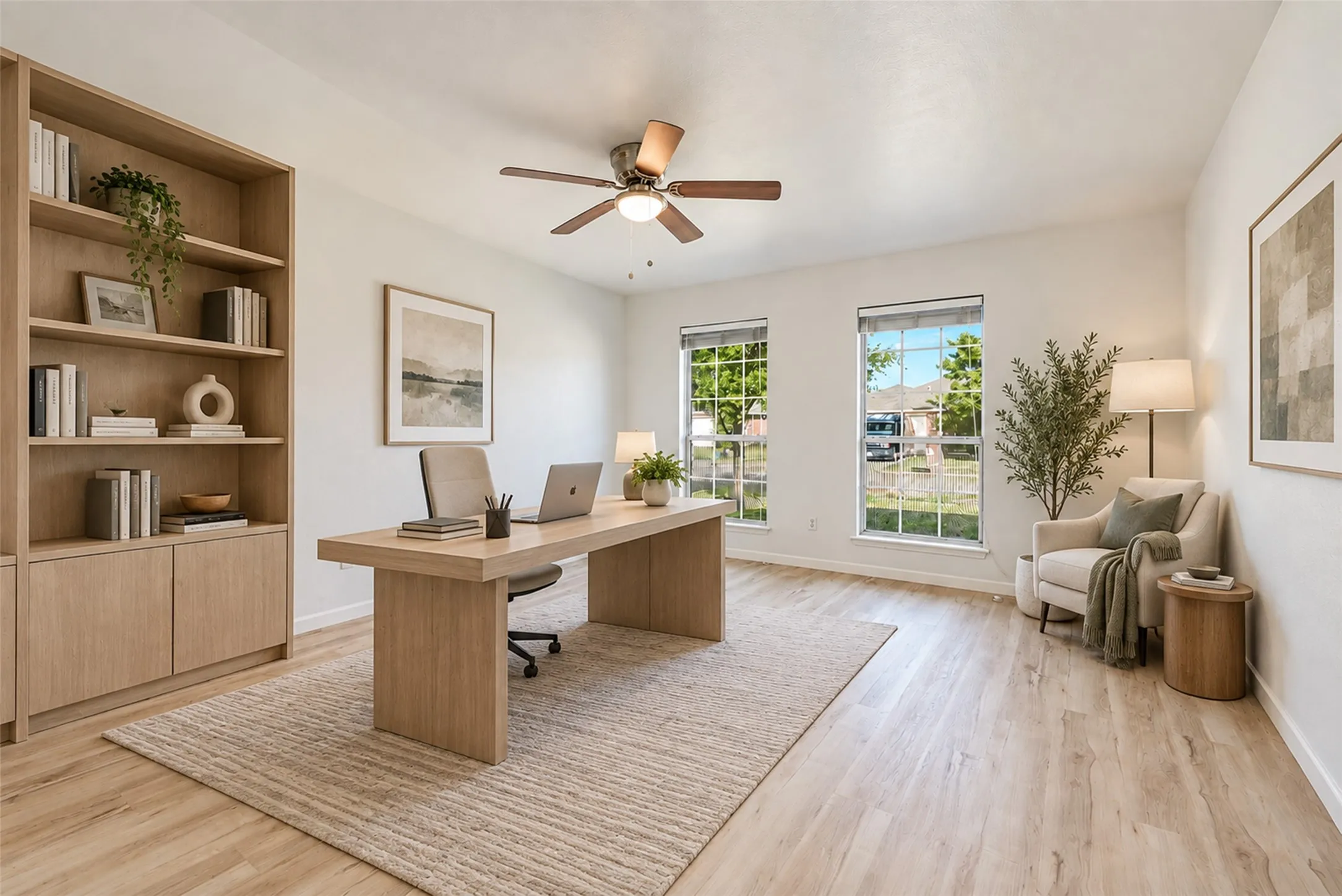 Recessed lighting, ceiling fan, built-in shelving, expansive windows, and wood-finish flooring