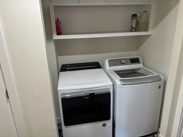Easy access to laundry room with built-in shelving