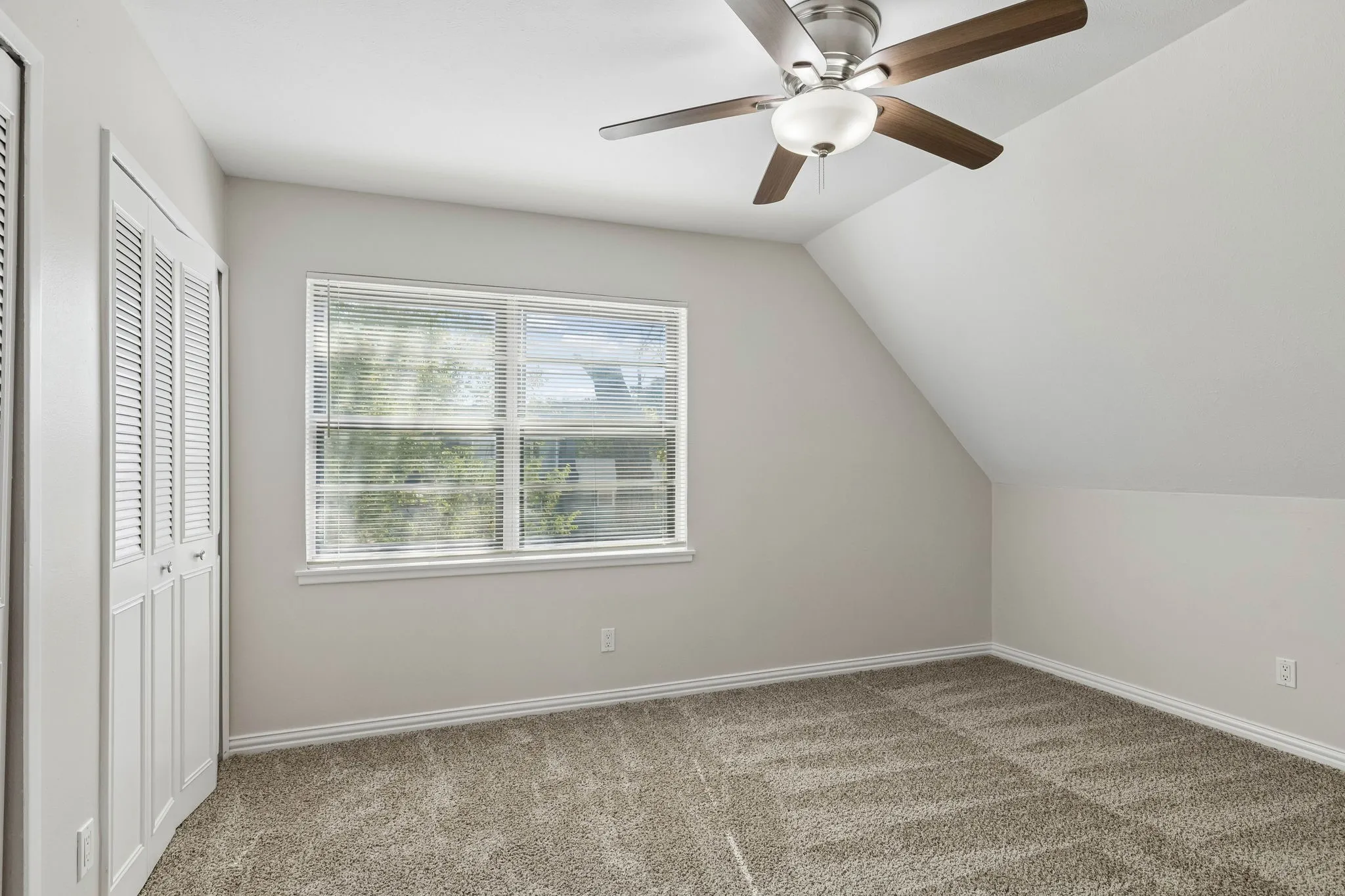 Large secondary bedroom with two closets