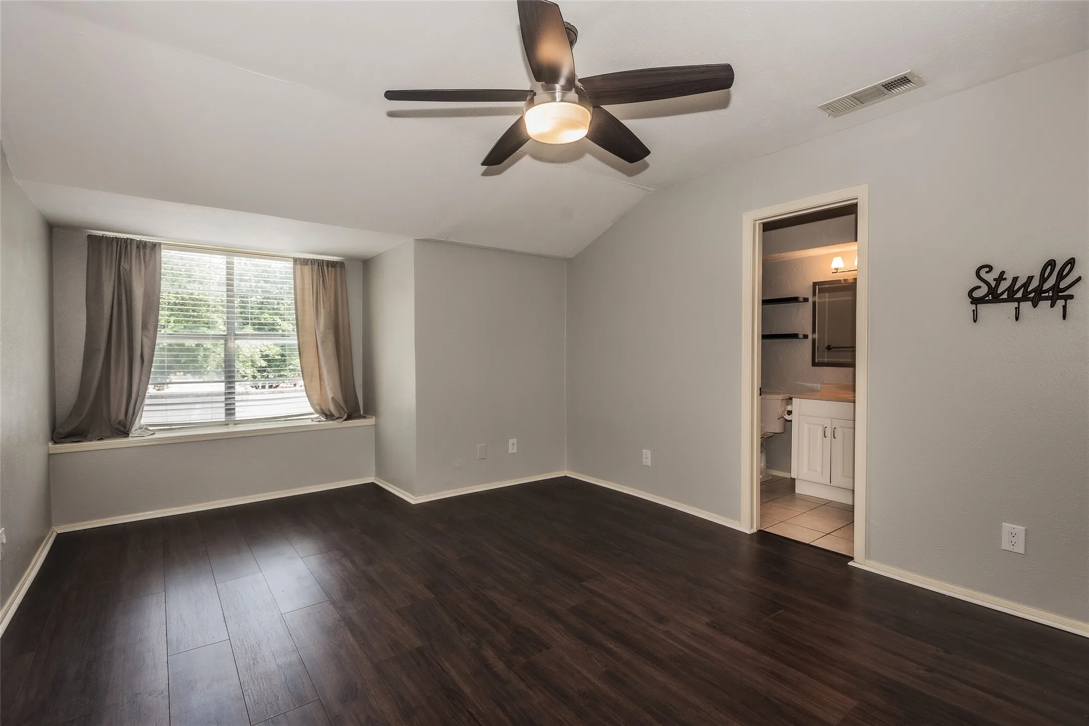 2nd Primary Bedroom shows off the charming window box seat at one end