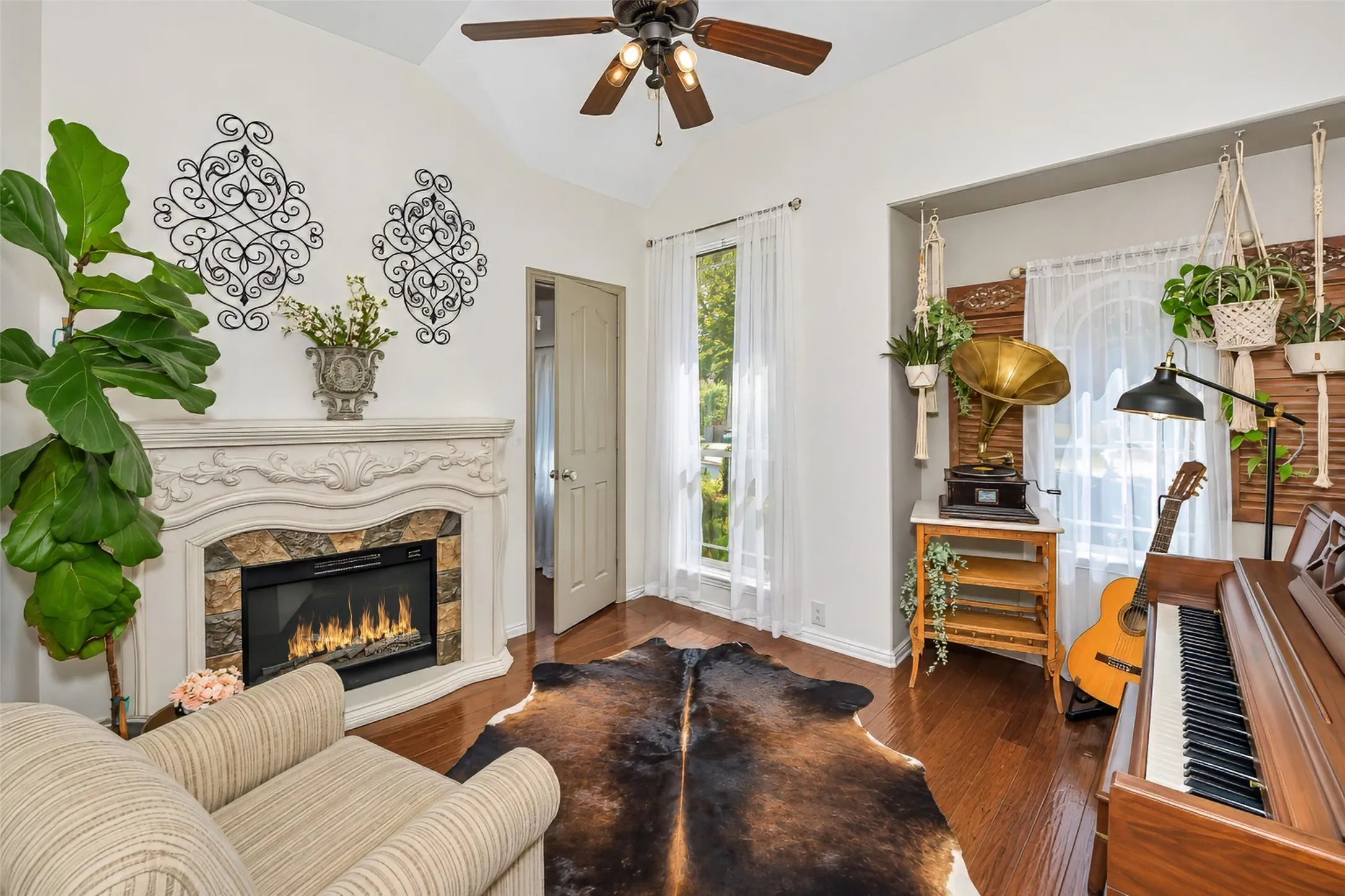 Room is currently used as a sitting room. Door leads into a closet, which is currently used as an office.