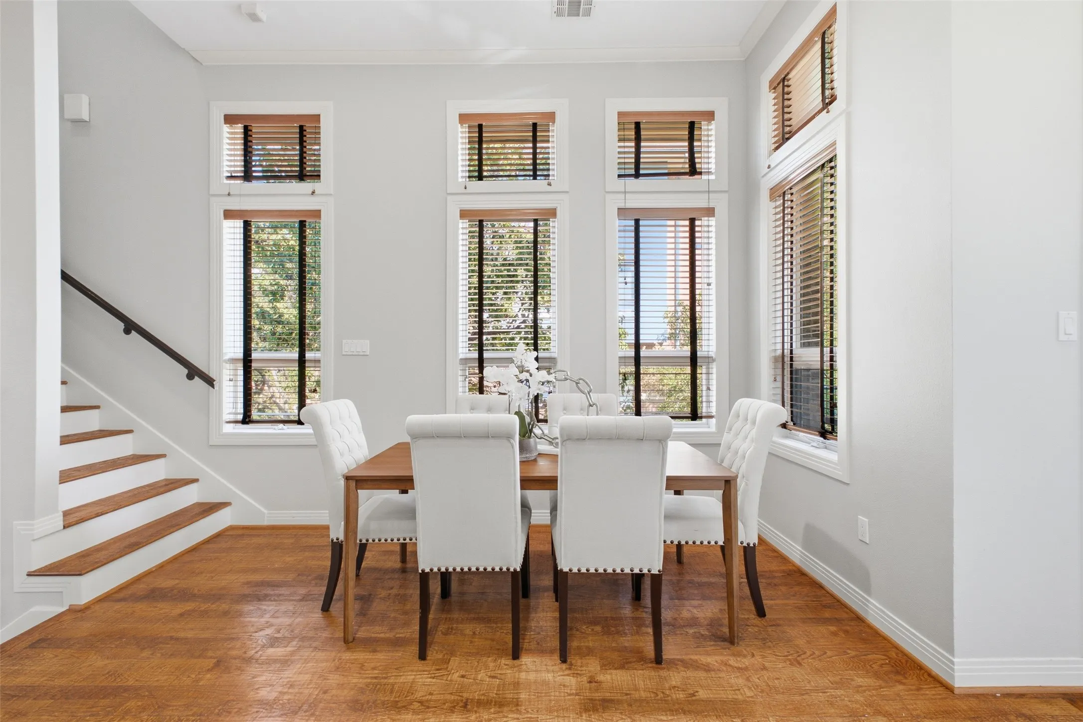 Two rows of windows pour daylight into the dining area all afternoon long