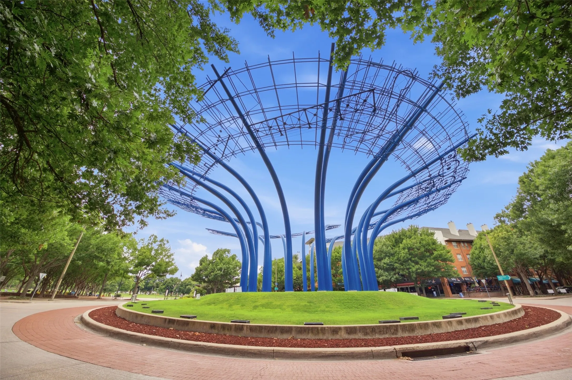 Blueprints, the landmark blue sculpture at Addison Circle, is the neighborhood's front porch