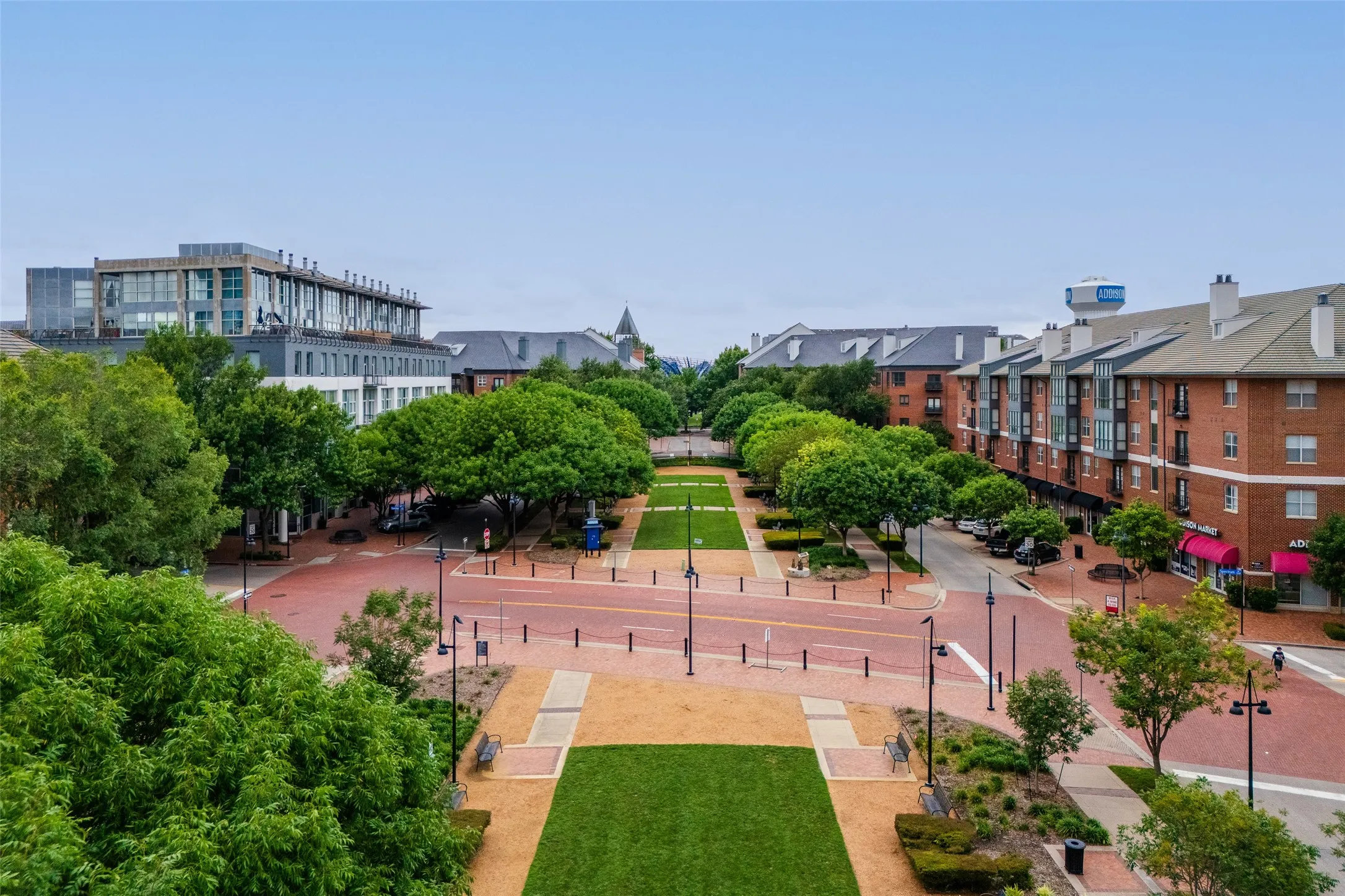 Restaurants, patios, and shops line the boulevard just a short stroll from the front steps