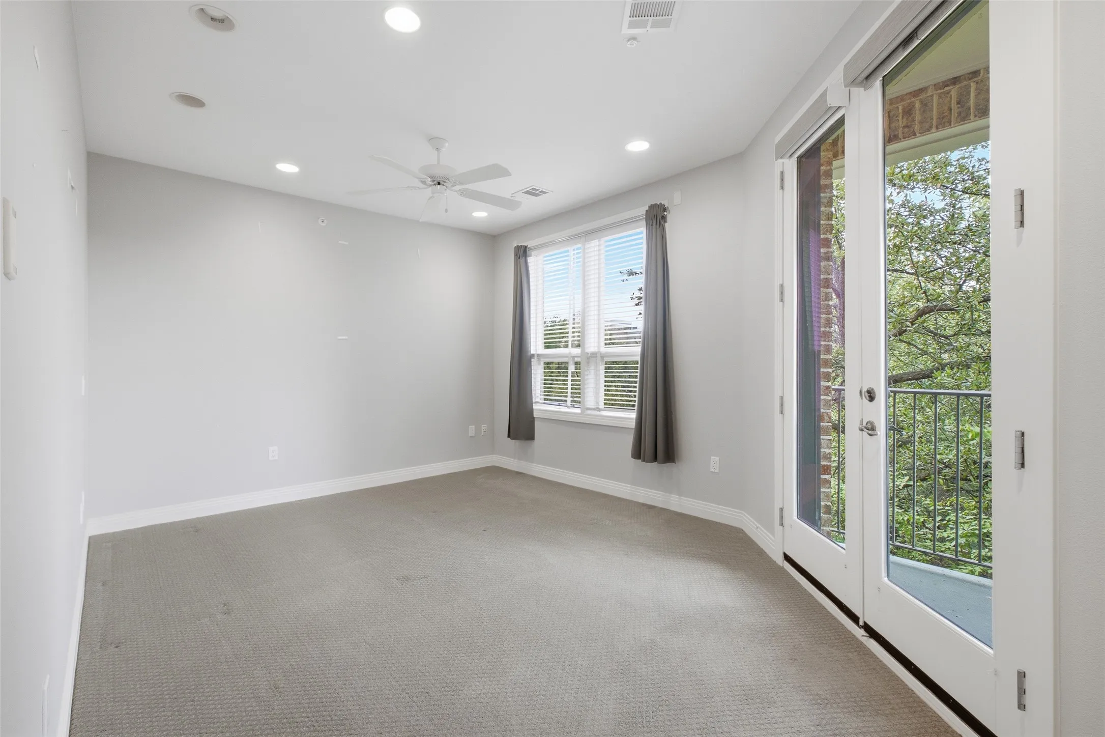 The second bedroom has French doors opening to its own private balcony